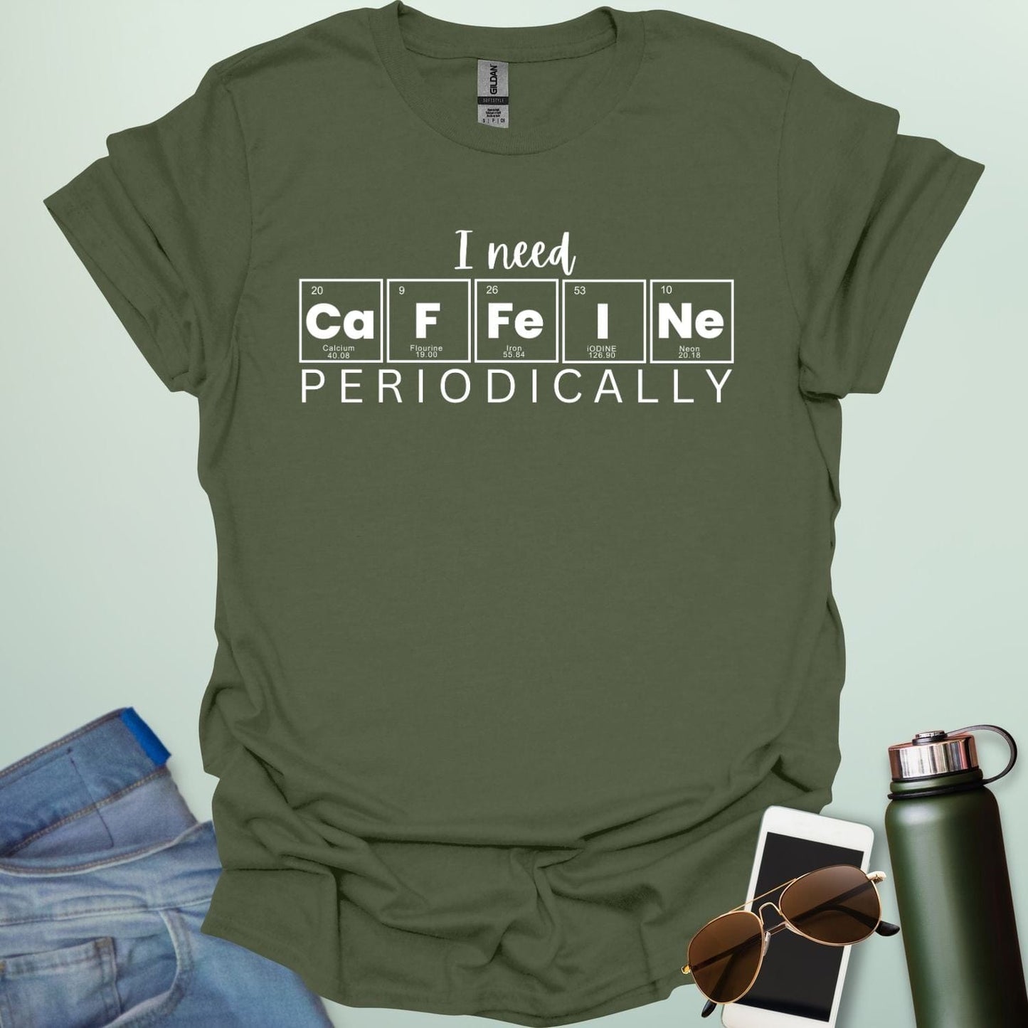Military green t-shirt with the white 'I need Caffeine Periodically' chemistry pun design.