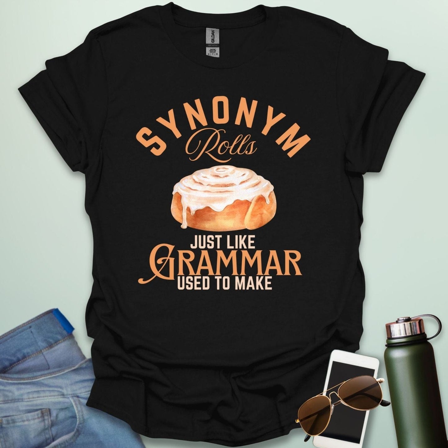 Black t-shirt with the black and white 'Synonym Rolls Just Like Grammar Used to Make' design.