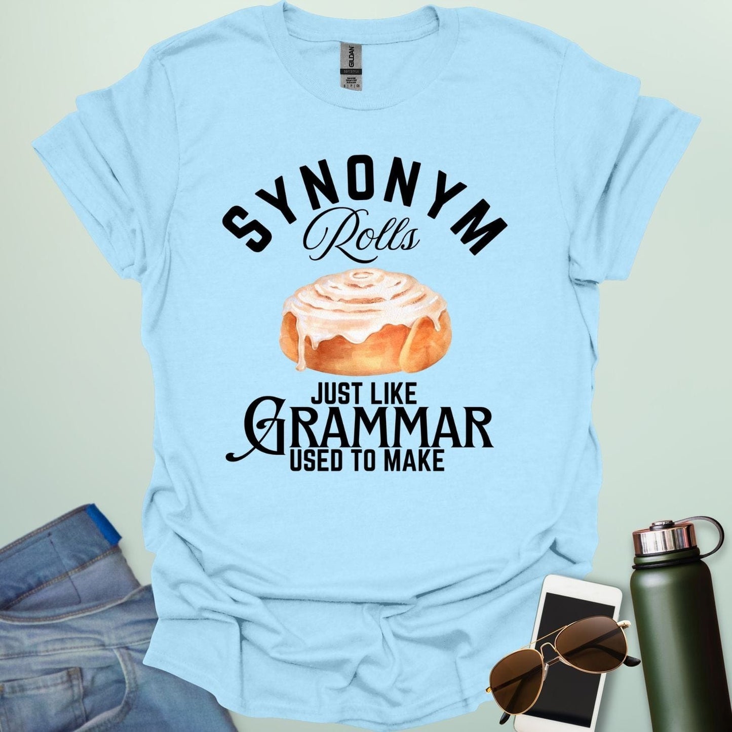 Light blue t-shirt with the black and white 'Synonym Rolls Just Like Grammar Used to Make' design.