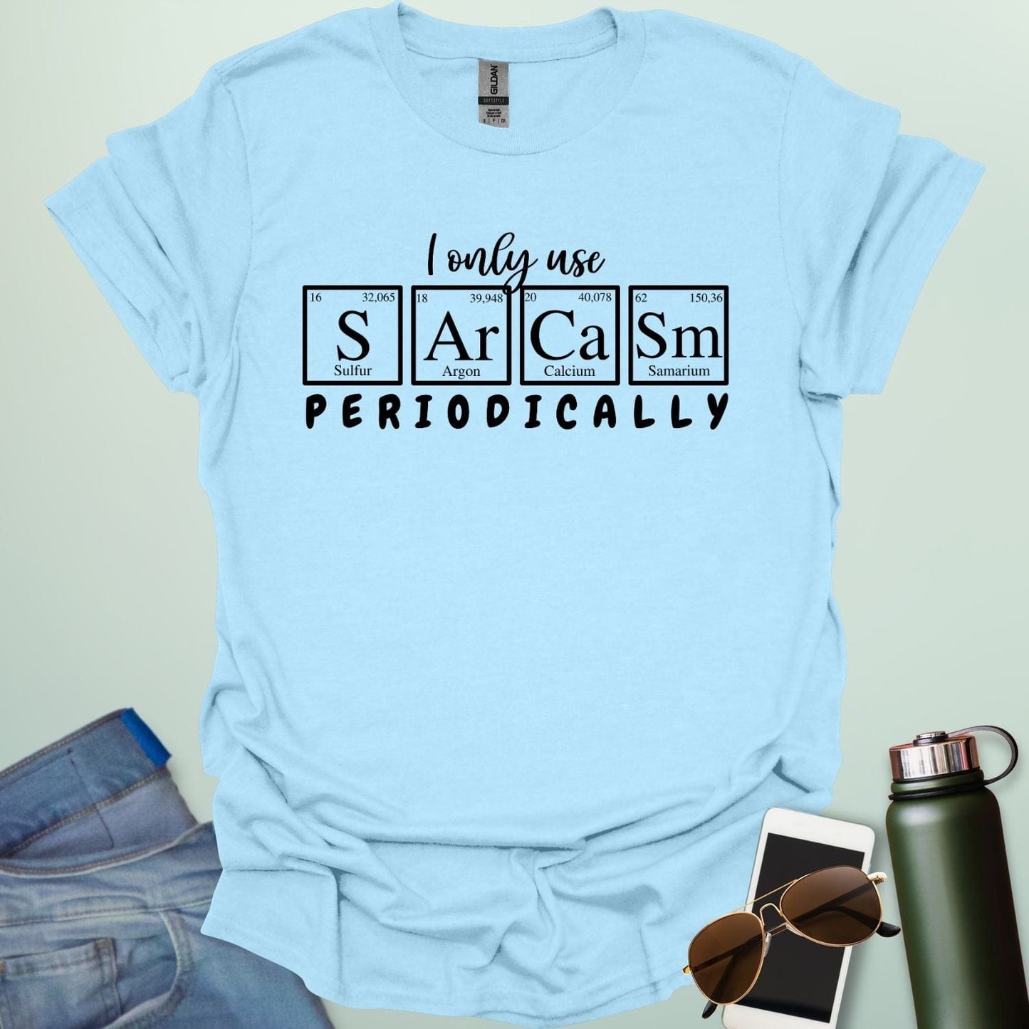 Light blue t-shirt with the white 'I only use Sarcasm Periodically' chemistry pun design.
