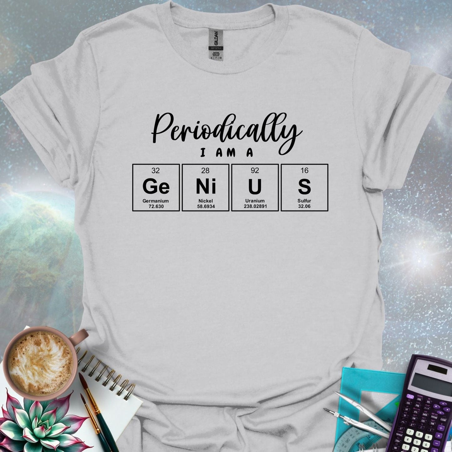 The text 'PERIODICALLY I AM A' above four periodic table element boxes with the symbols Ge, Ni, U, and S, spelling out 'GENIUS'.