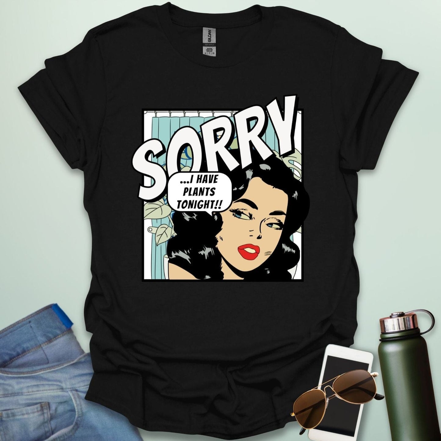 A black t-shirt with a retro comic-book style illustration of a woman and the text 'SORRY ...I HAVE PLANTS TONIGHT!!'