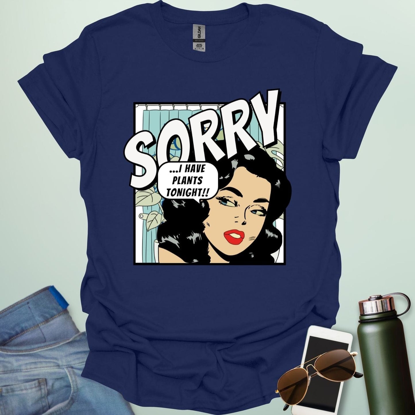 A navy blue t-shirt with a retro comic-book style illustration of a woman and the text 'SORRY ...I HAVE PLANTS TONIGHT!!'