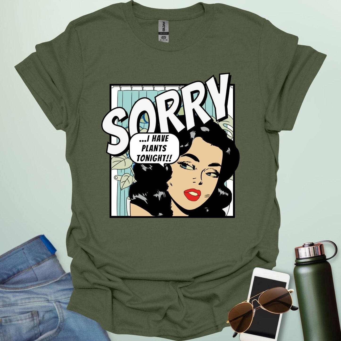 A military green t-shirt with a retro comic-book style illustration of a woman and the text 'SORRY ...I HAVE PLANTS TONIGHT!!'