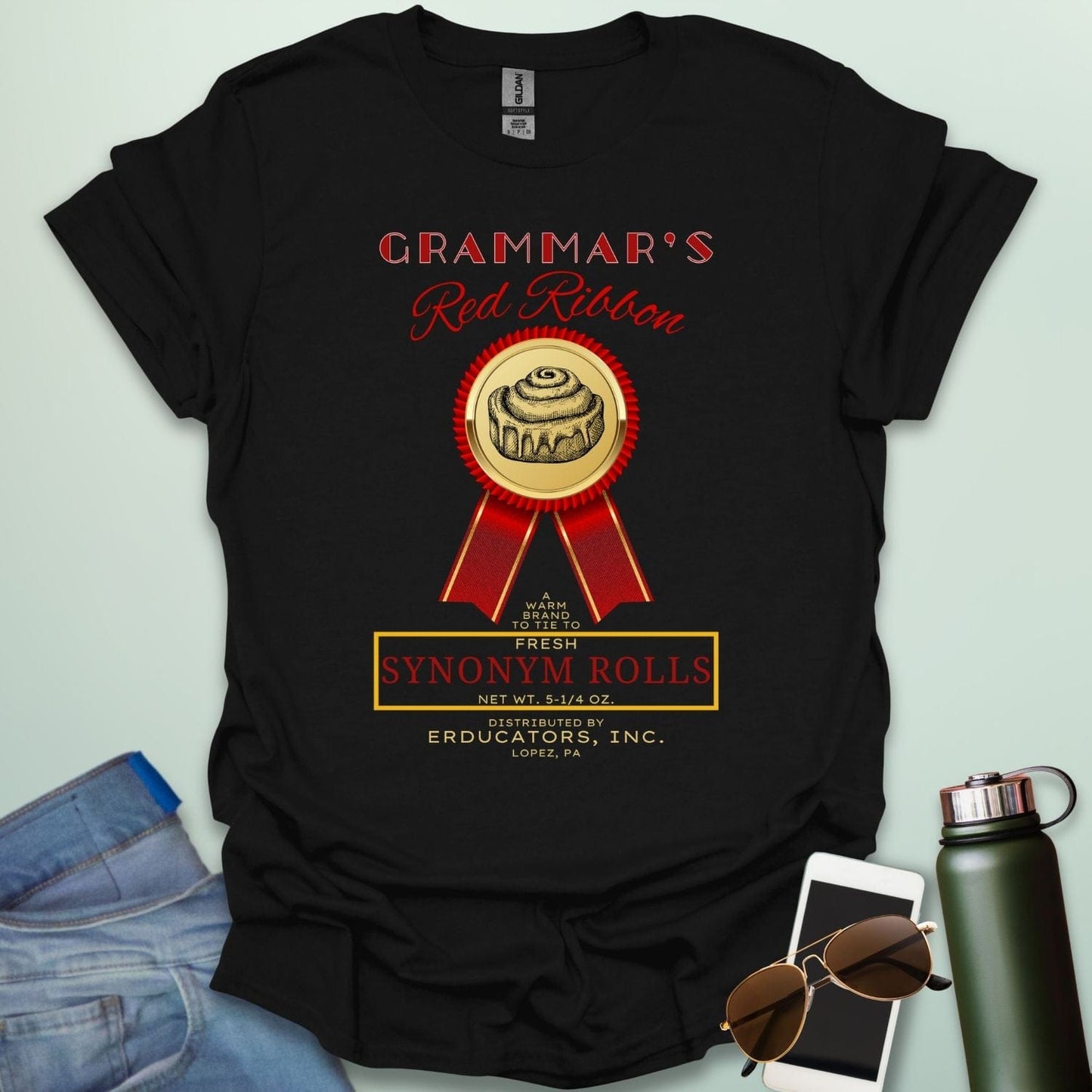 Grammar's Synonym Rolls t-shirt featuring a red ribbon award for fresh cinnamon rolls. Ideal funny gift for English teachers, writers, and grammar nerds.