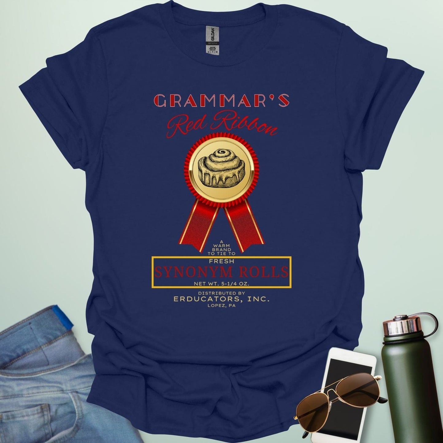 Grammar's Synonym Rolls t-shirt featuring a red ribbon award for fresh cinnamon rolls. Ideal funny gift for English teachers, writers, and grammar nerds.