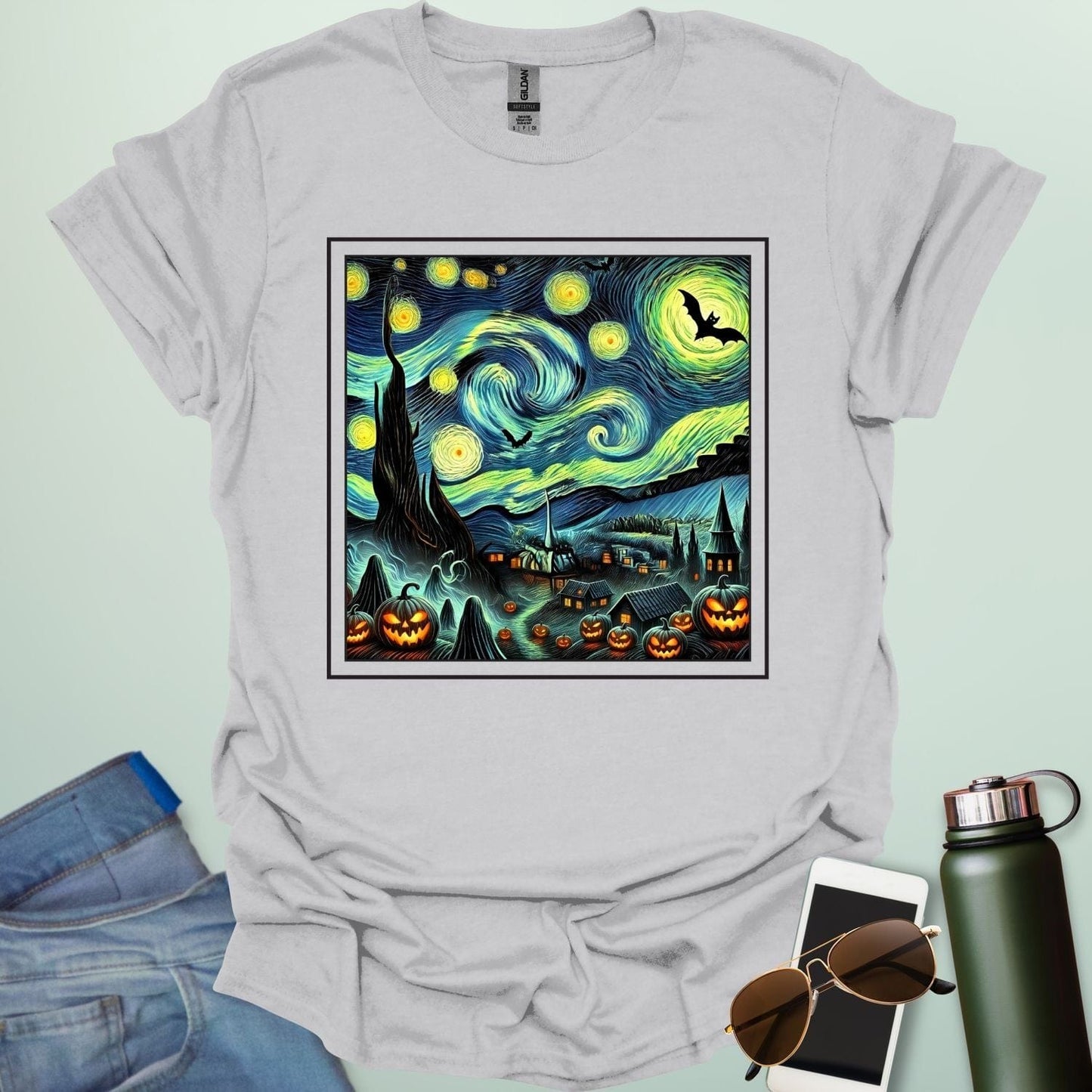 Starry Nights & Jack-O-Lanterns t-shirt featuring illuminated jack-o-lanterns under a star-filled sky — spooky Halloween design.