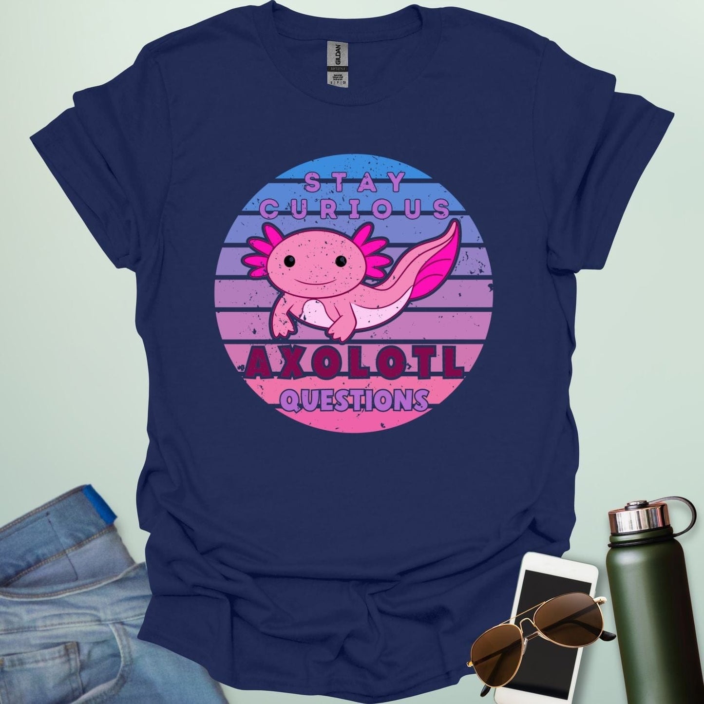 A navy blue t-shirt with a cute axolotl in a circular design and the text 'Stay Curious Axolotl Questions.'