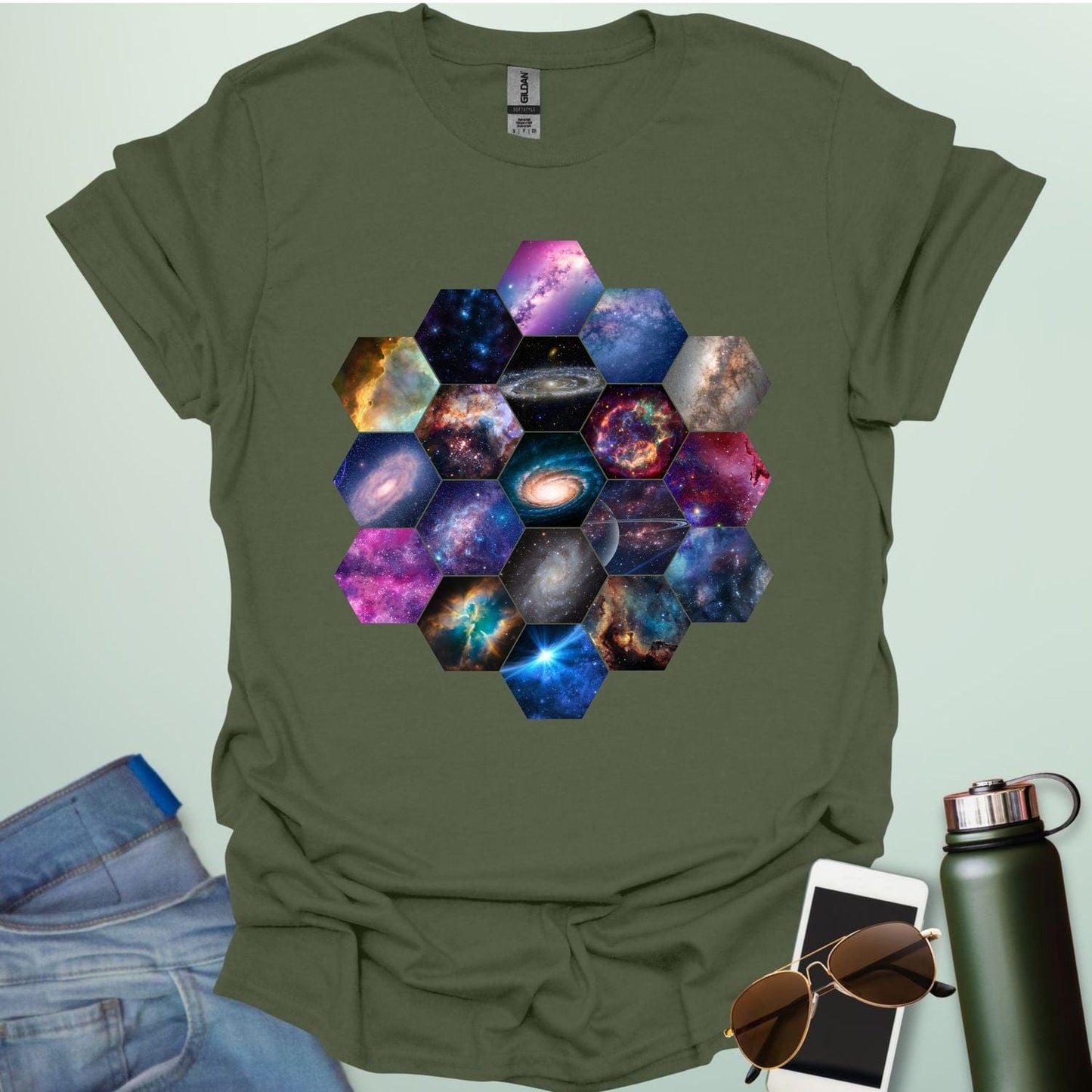 T-shirt design featuring a hexagonal pattern inspired by the James Webb Space Telescope's mirror, each hexagon filled with a different image of the cosmos.