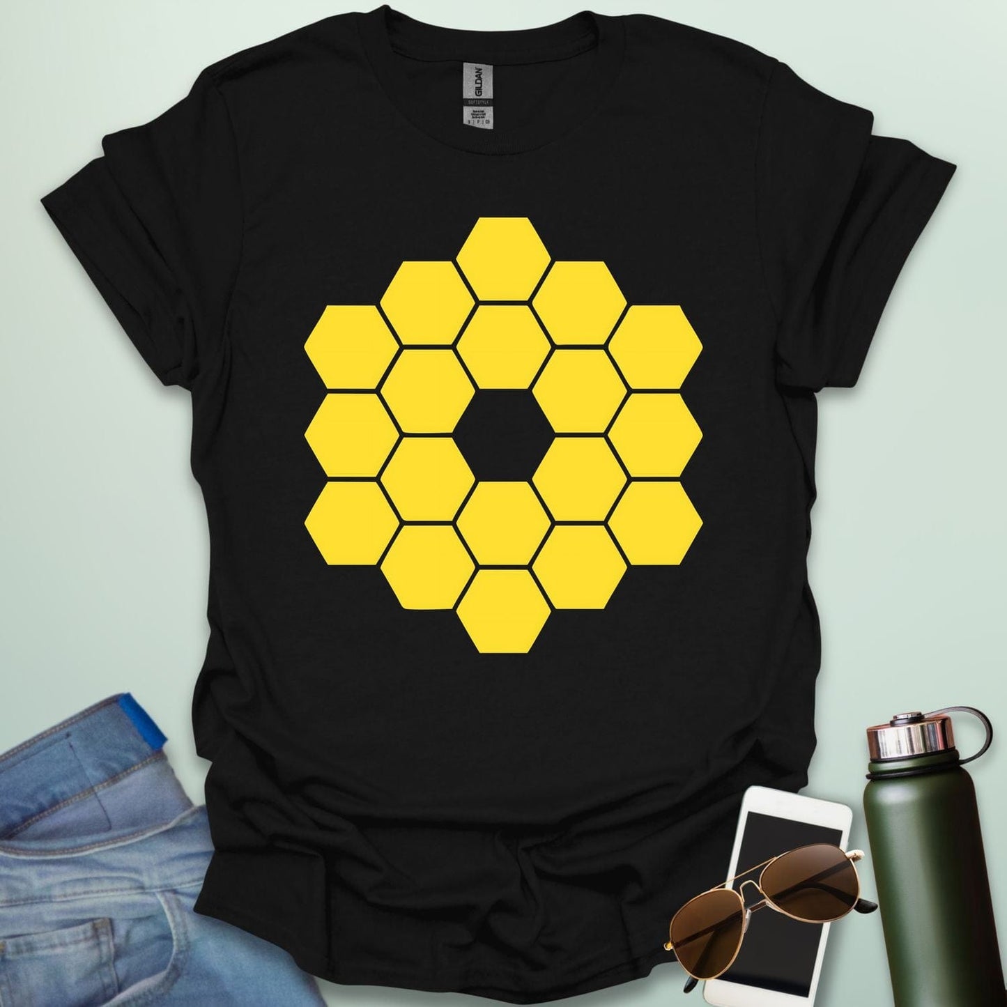 A yellow icon representing the James Webb Space Telescope's hexagonal mirror array.