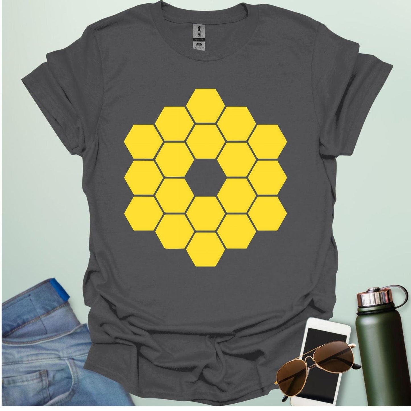 A yellow icon representing the James Webb Space Telescope's hexagonal mirror array.