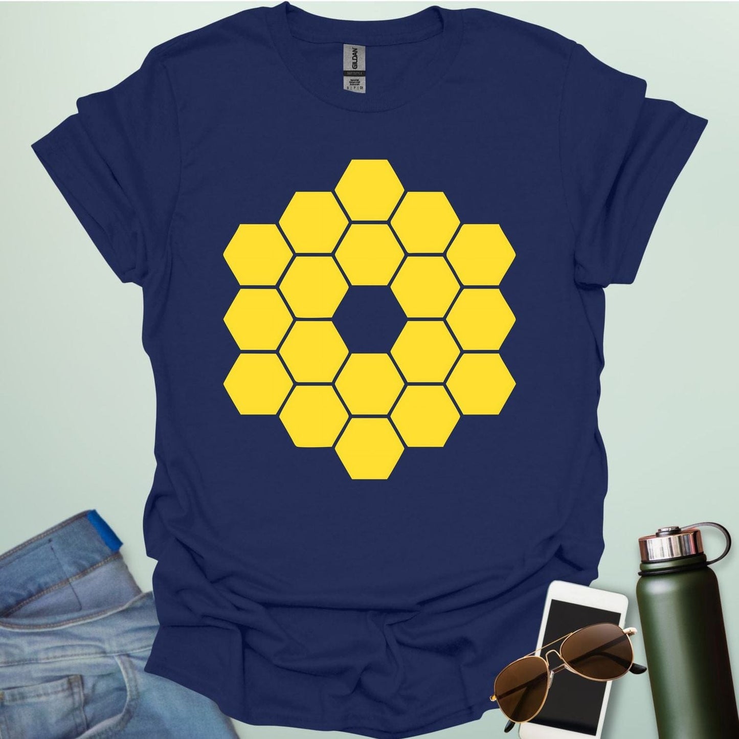 A yellow icon representing the James Webb Space Telescope's hexagonal mirror array.