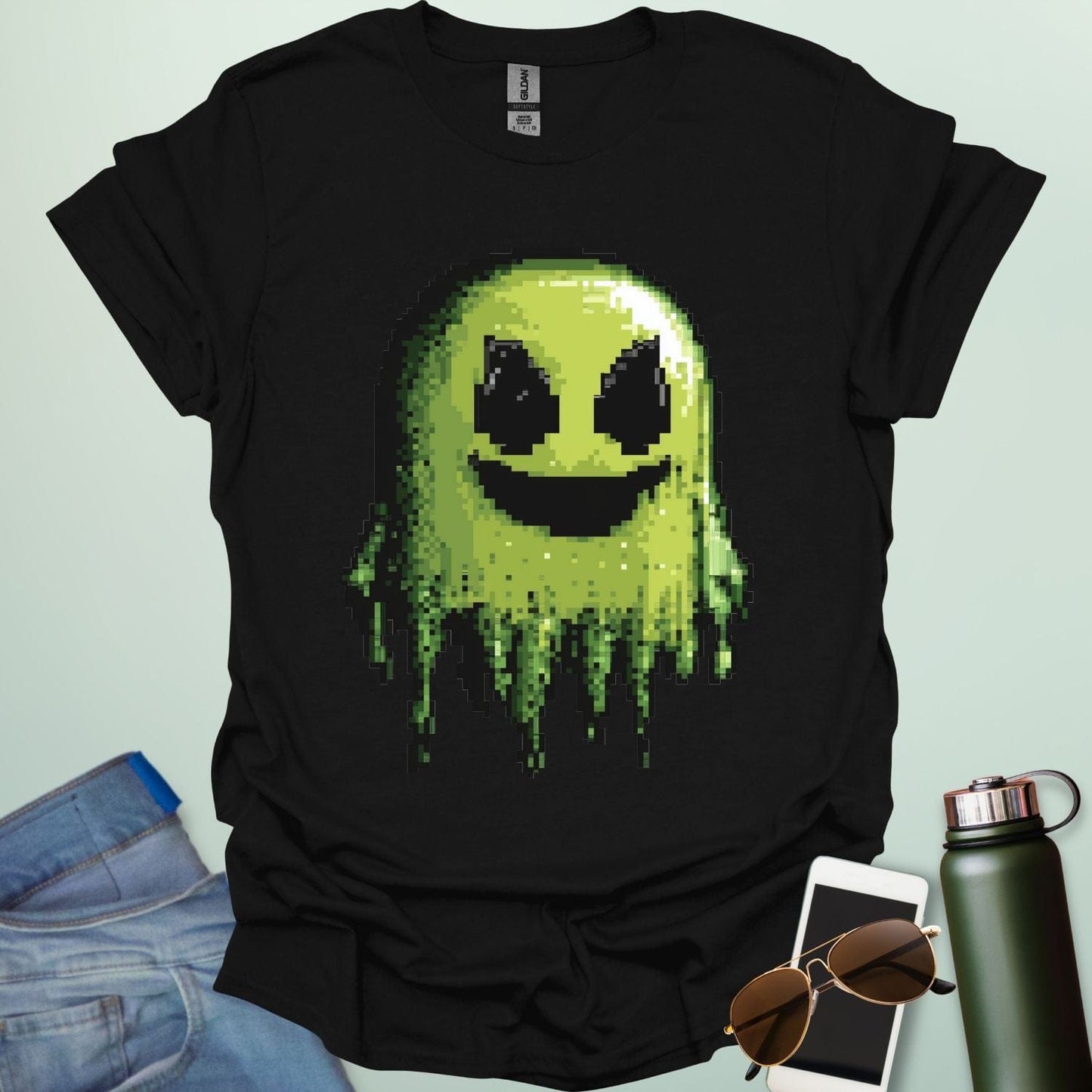 Pixel Ghost t-shirt featuring 8-bit style ghost graphic โ a retro video-game inspired design for coders, gamers and lovers of spooky fun.
