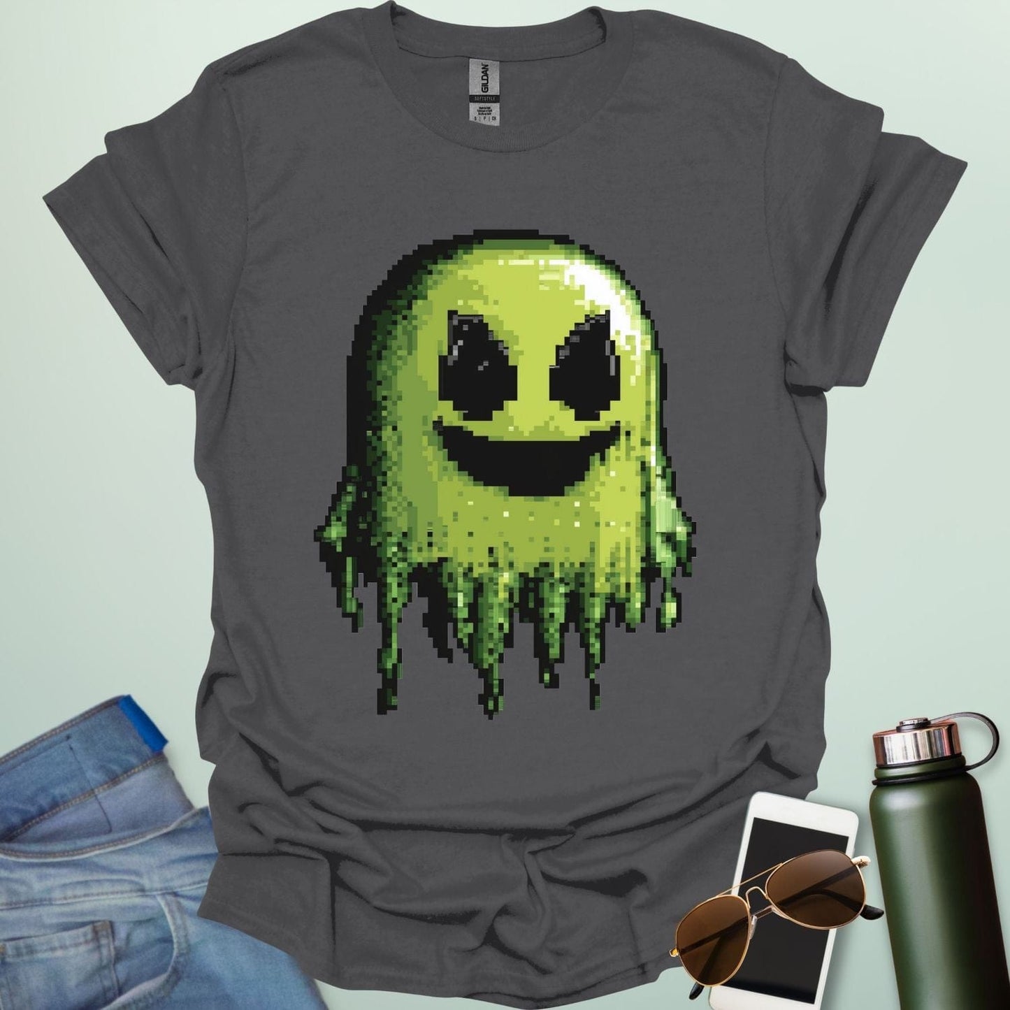Pixel Ghost t-shirt featuring 8-bit style ghost graphic โ a retro video-game inspired design for coders, gamers and lovers of spooky fun.