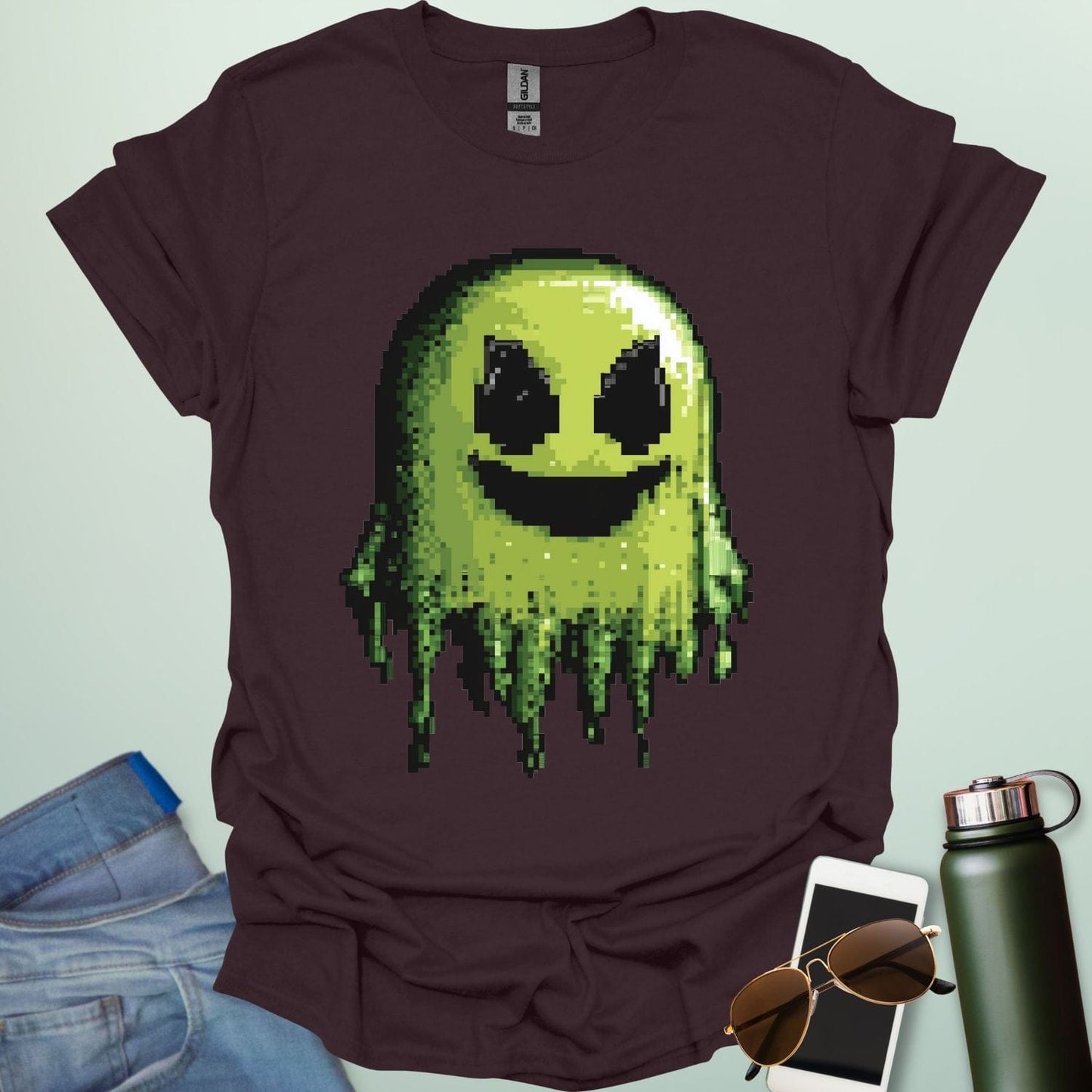 Pixel Ghost t-shirt featuring 8-bit style ghost graphic โ a retro video-game inspired design for coders, gamers and lovers of spooky fun.