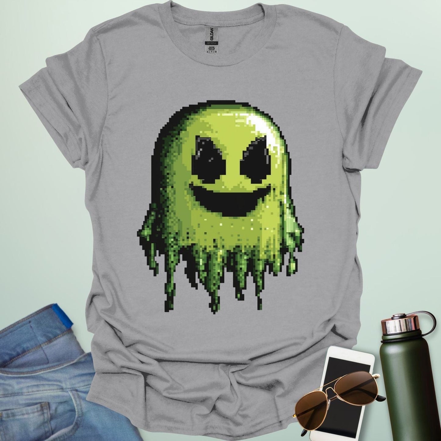 Pixel Ghost t-shirt featuring 8-bit style ghost graphic โ a retro video-game inspired design for coders, gamers and lovers of spooky fun.