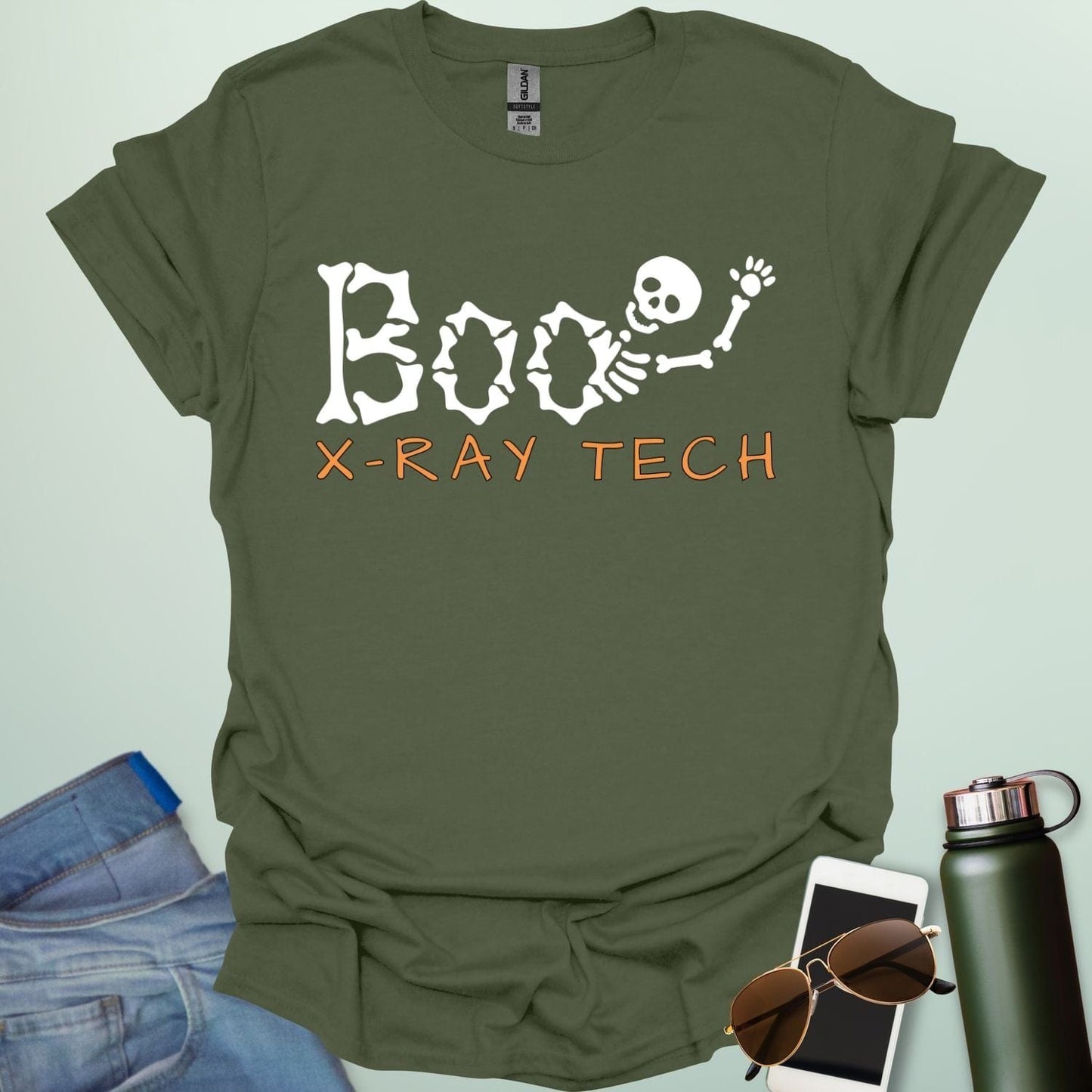 Boo X-Ray Tech t-shirt featuring X-ray imagery and spooky Halloween theme — design for radiology techs and medical imaging fans.