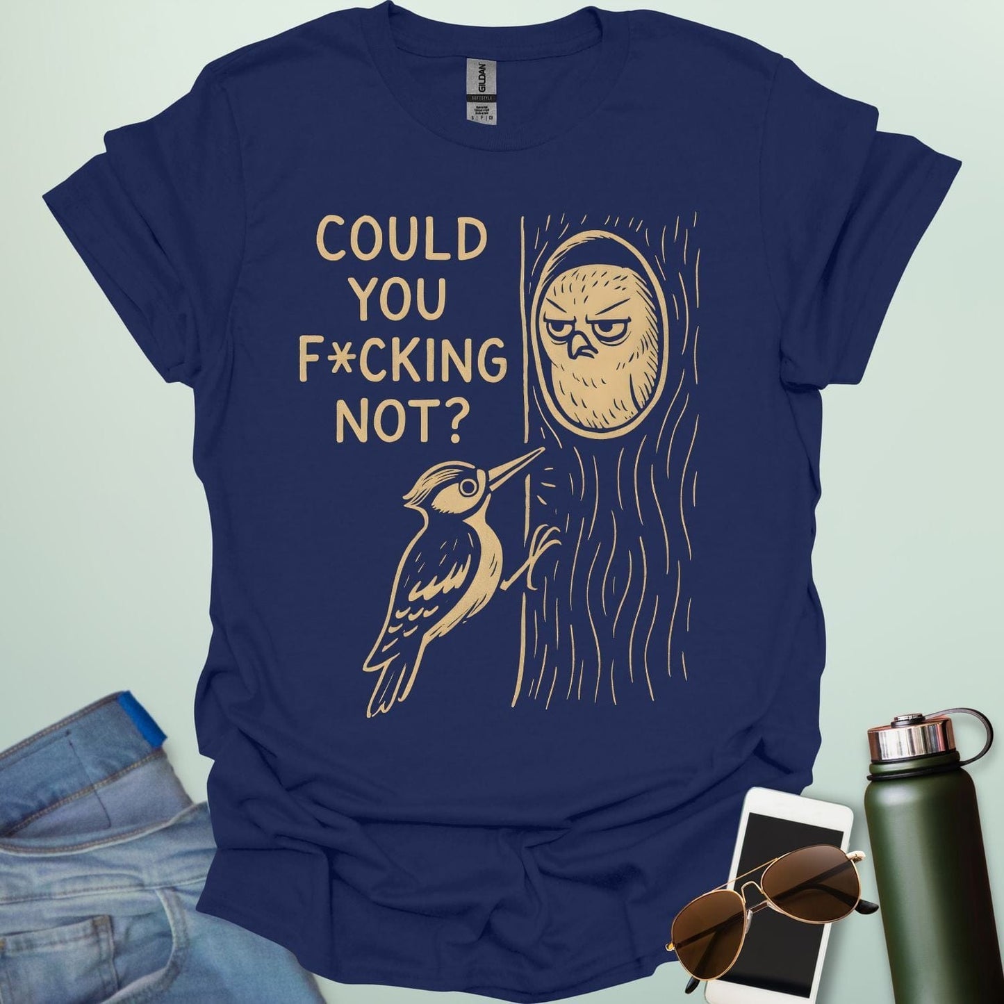 Minimal illustration of an irritated owl peeking from its tree burrow while a woodpecker pecks at the trunk, with bold text reading “COULD YOU F*CKING NOT?” on a dark background.