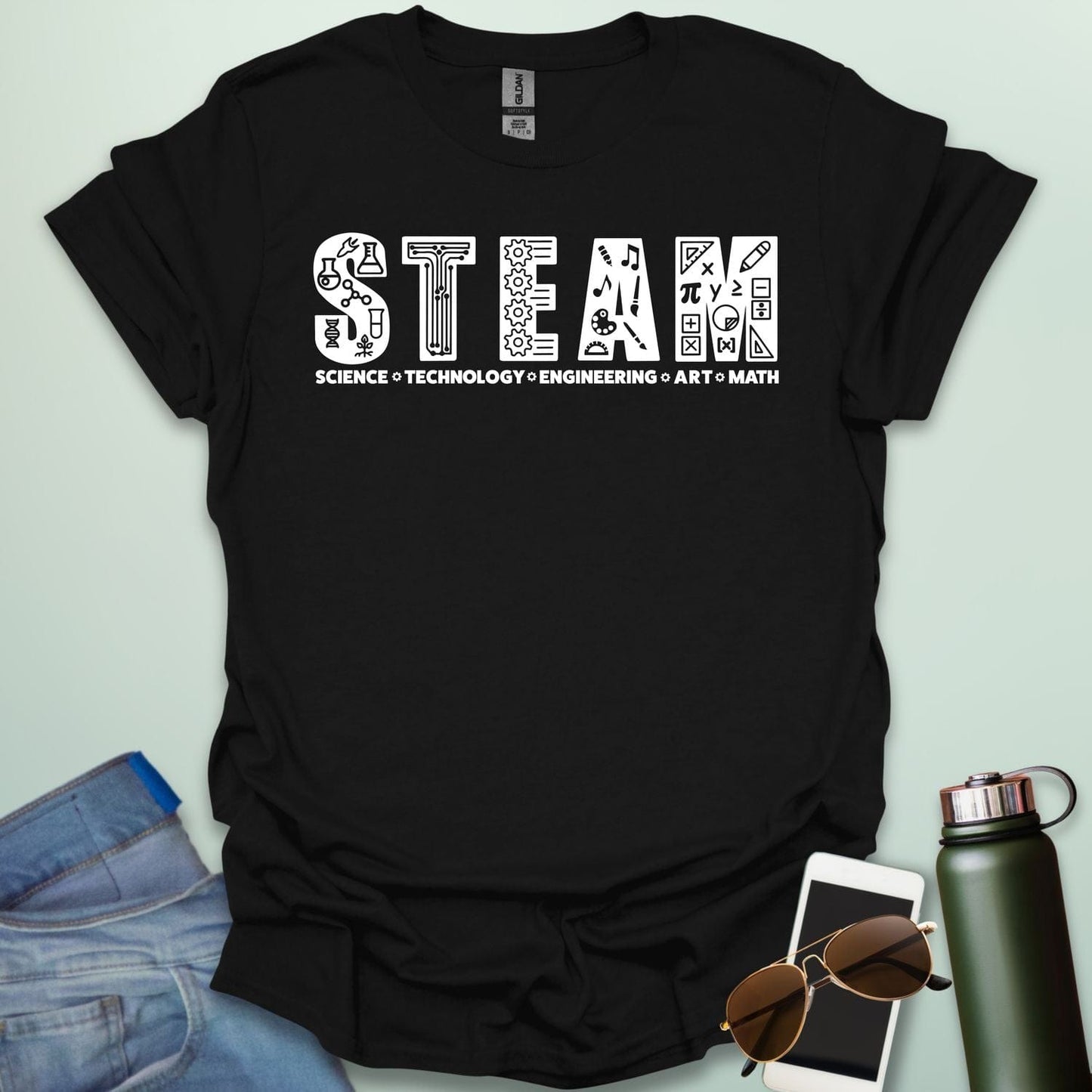 Black tee with the word 'STEAM' with each letter filled with related icons, and the words 'SCIENCE TECHNOLOGY ENGINEERING ART MATH' below.
