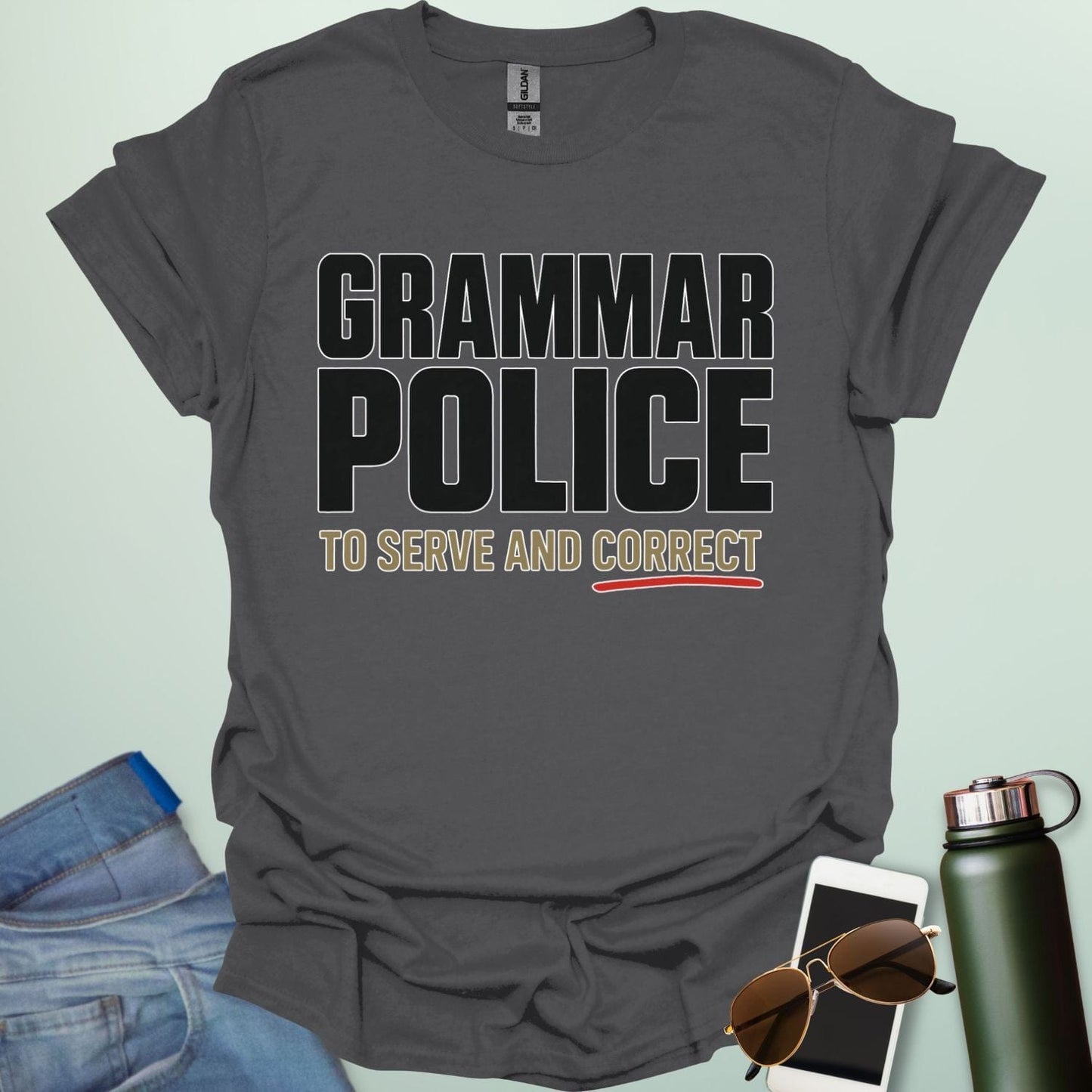‘Grammar Police: To Serve & Correct’ t-shirt with badge-style typography — witty grammar humor shirt for editors, teachers, and word nerds.