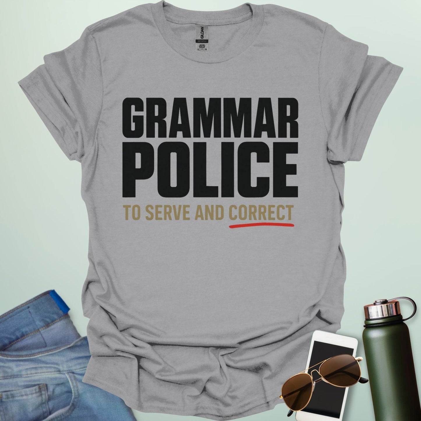 ‘Grammar Police: To Serve & Correct’ t-shirt with badge-style typography — witty grammar humor shirt for editors, teachers, and word nerds.