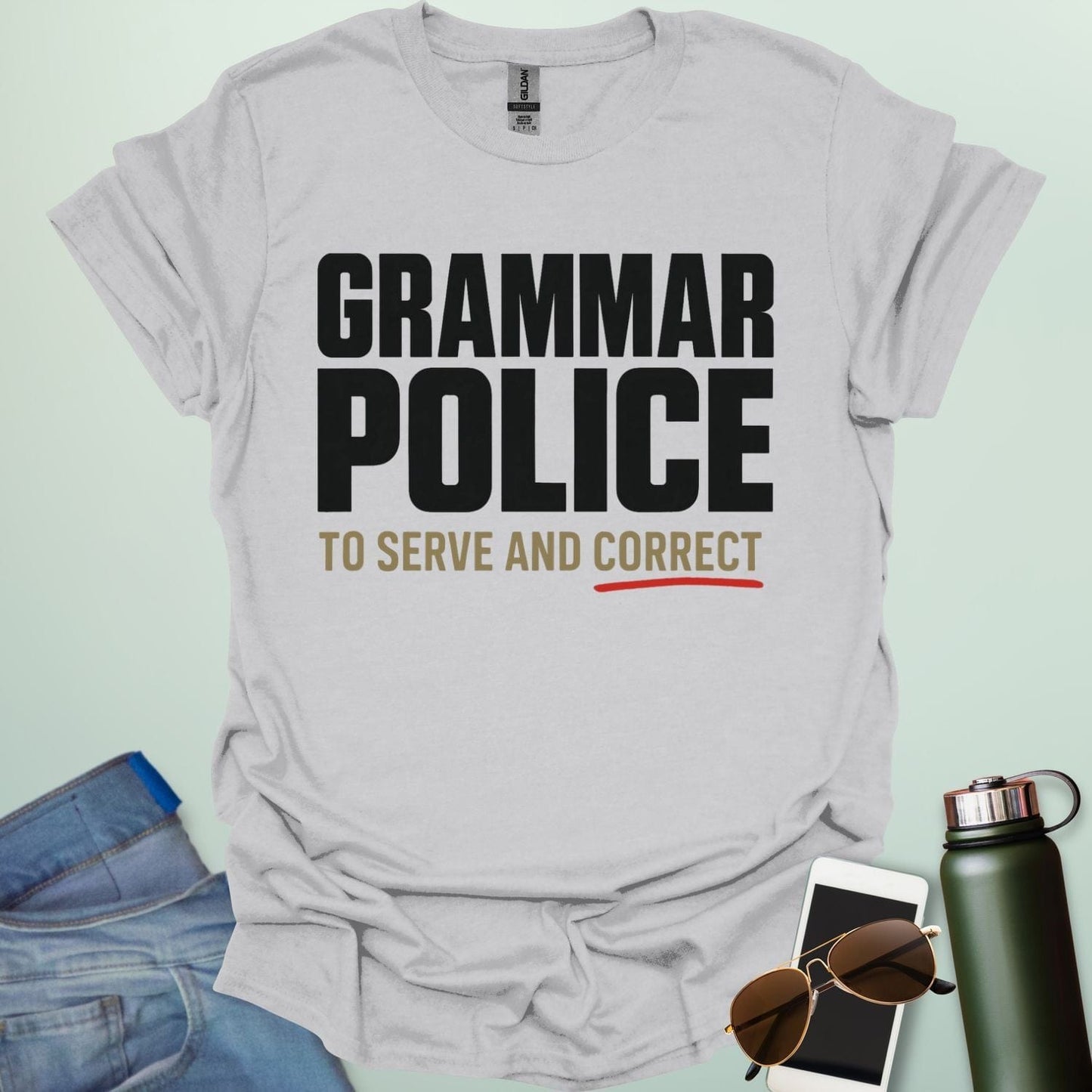 ‘Grammar Police: To Serve & Correct’ t-shirt with badge-style typography — witty grammar humor shirt for editors, teachers, and word nerds.