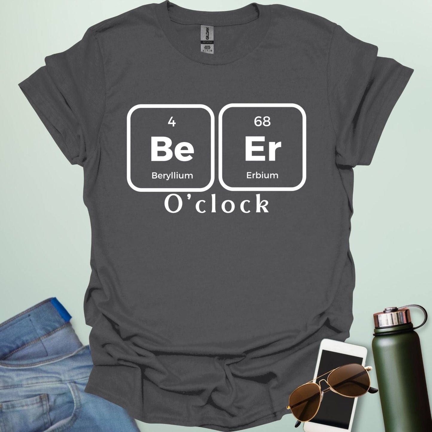 A funny chemistry t-shirt featuring a periodic table pun for 'Beer O'clock' using the elements Beryllium (Be) and Erbium (Er).