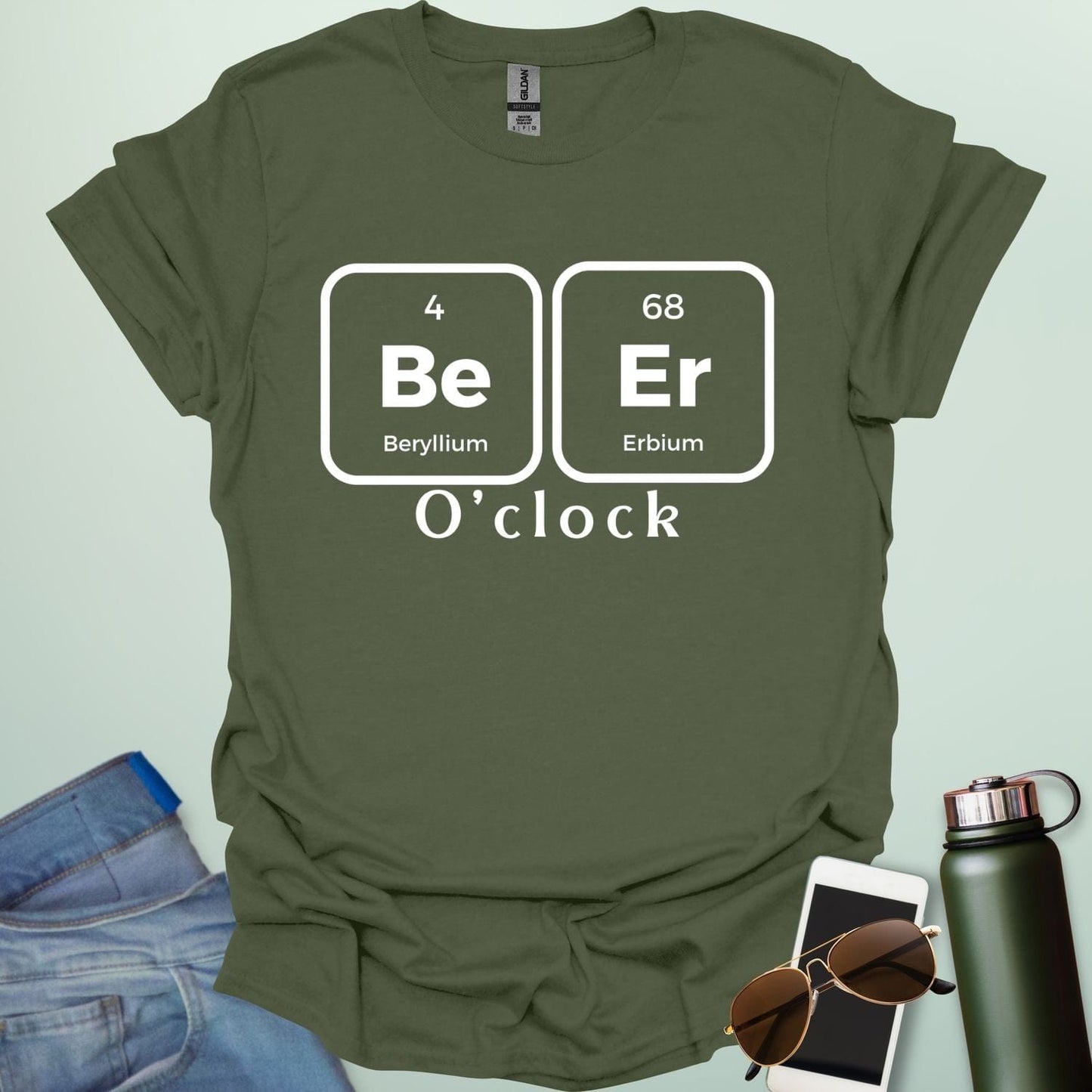 A funny chemistry t-shirt featuring a periodic table pun for 'Beer O'clock' using the elements Beryllium (Be) and Erbium (Er).