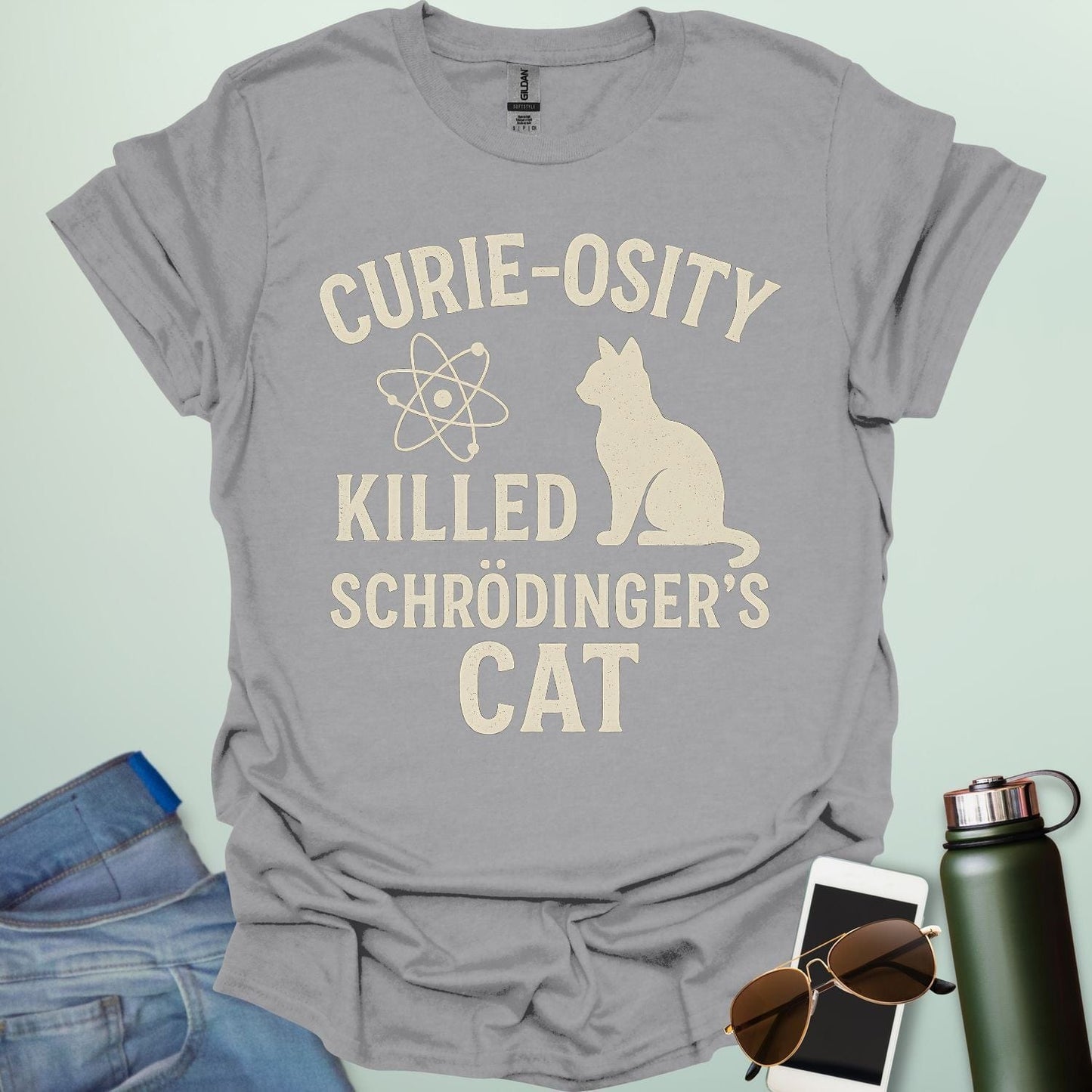 ‘Curie-osity Killed Schrödinger’s Cat’ t-shirt with humorous science design — a mashup referencing Curie + Schrödinger’s cat for physicists & curious minds.