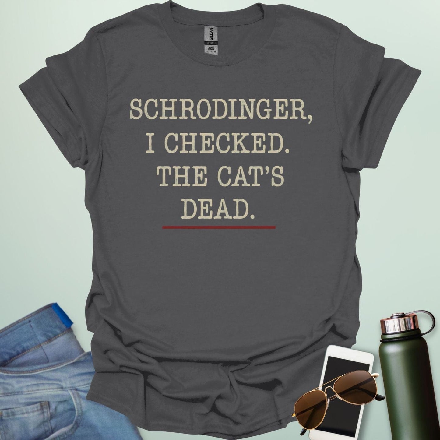 ‘Schrödinger: I Checked the Cat’s Dead’ t-shirt with bold typography — quantum physics humor design for nerds and cat lovers.