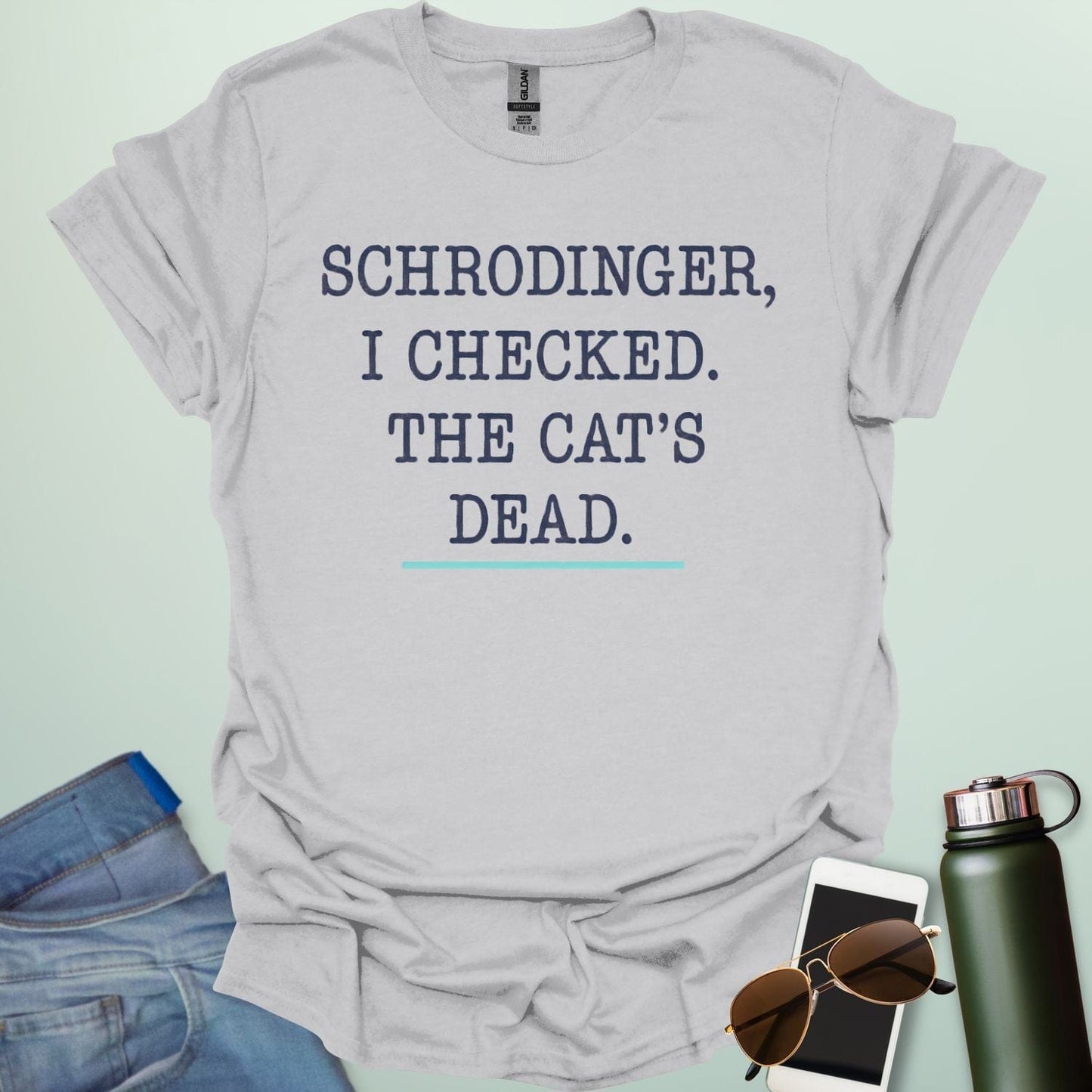 ‘Schrödinger: I Checked the Cat’s Dead’ t-shirt with bold typography — quantum physics humor design for nerds and cat lovers.