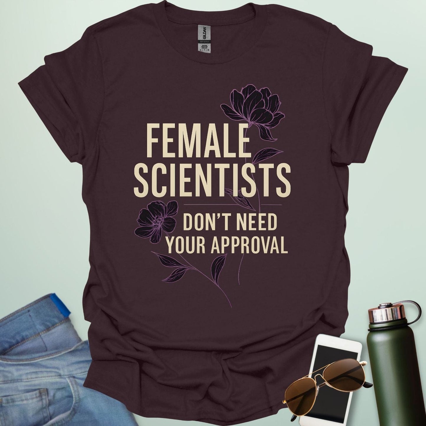 ‘Female Scientists Don’t Need Your Approval’ t-shirt with bold typography — feminist STEM apparel celebrating confident women in science.