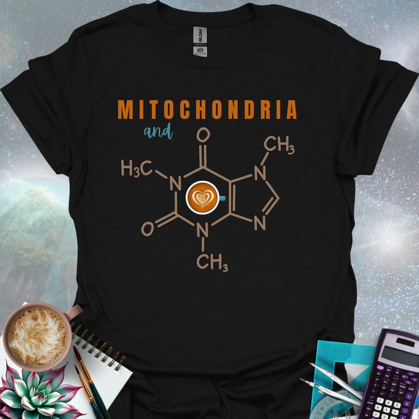 The word 'MITOCHONDRIA' above the word 'and' above the chemical structure of caffeine with a coffee cup icon containing a latte art heart in the center. Below the caffeine structure are chemical symbols.