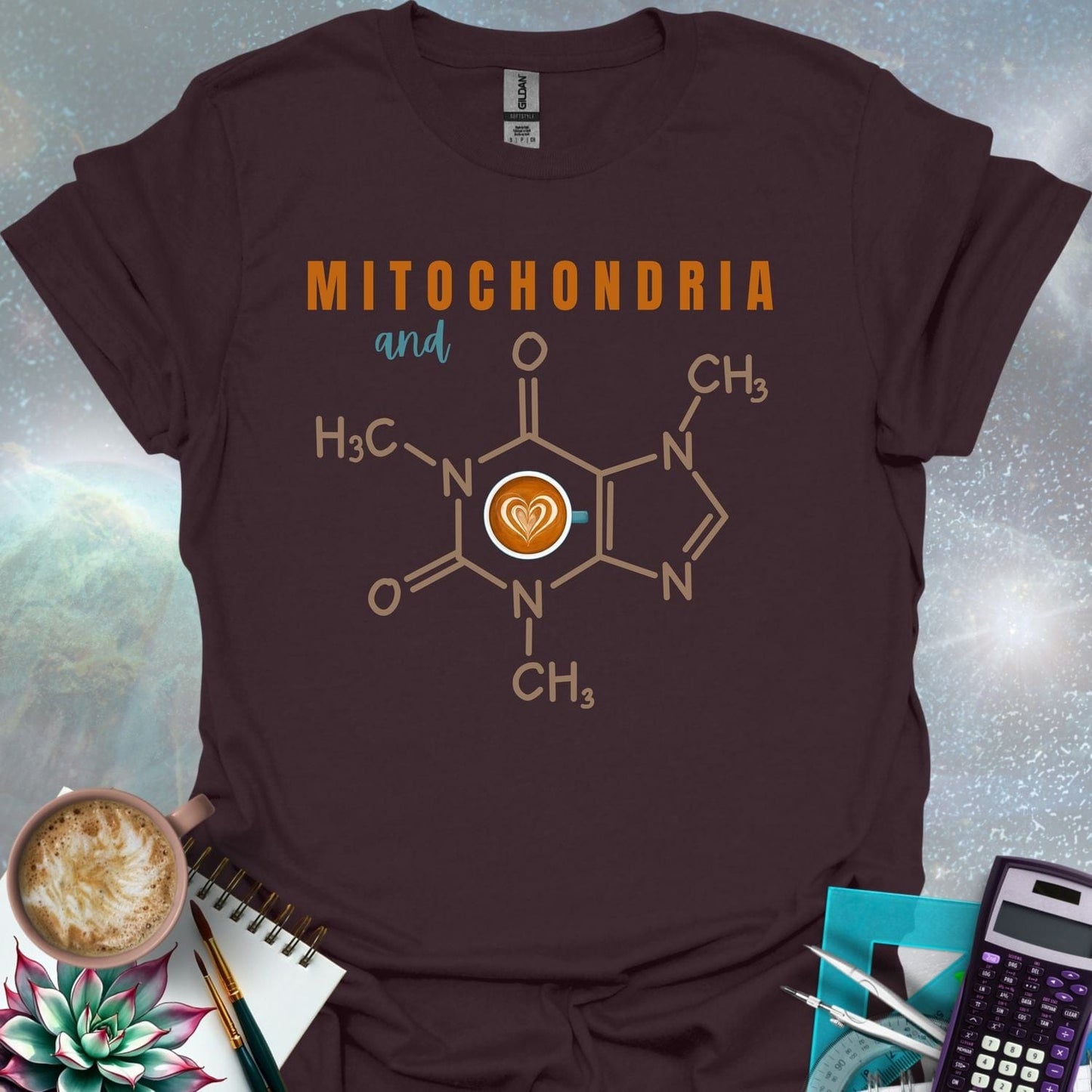 The word 'MITOCHONDRIA' above the word 'and' above the chemical structure of caffeine with a coffee cup icon containing a latte art heart in the center. Below the caffeine structure are chemical symbols.