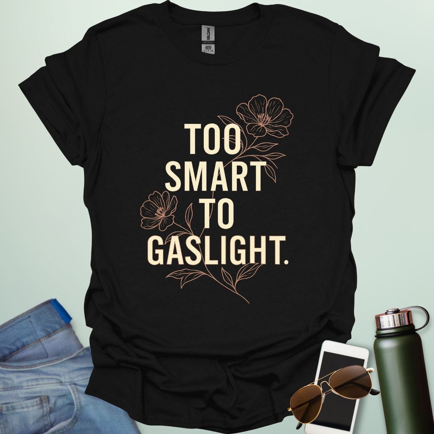 ‘Too Smart to Gaslight’ t-shirt with bold typography — statement tee for thinkers and mental health advocates.