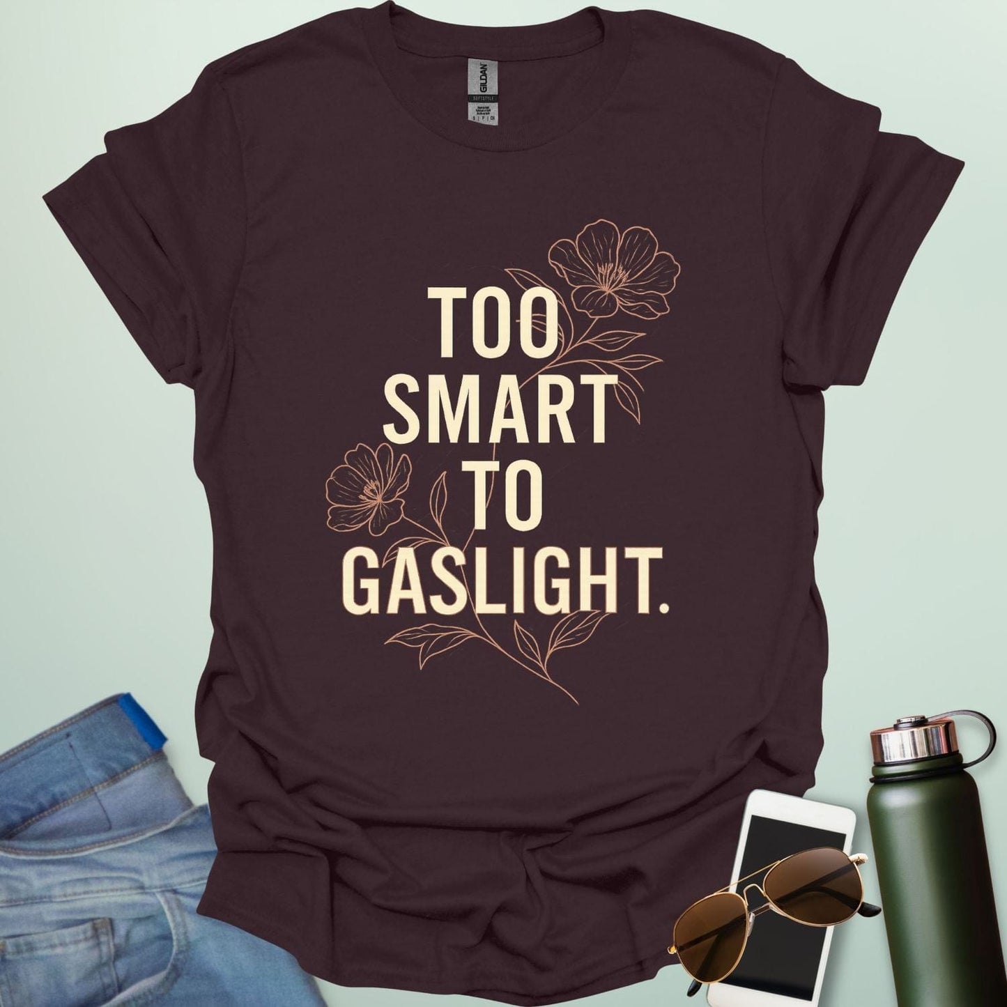 ‘Too Smart to Gaslight’ t-shirt with bold typography — statement tee for thinkers and mental health advocates.