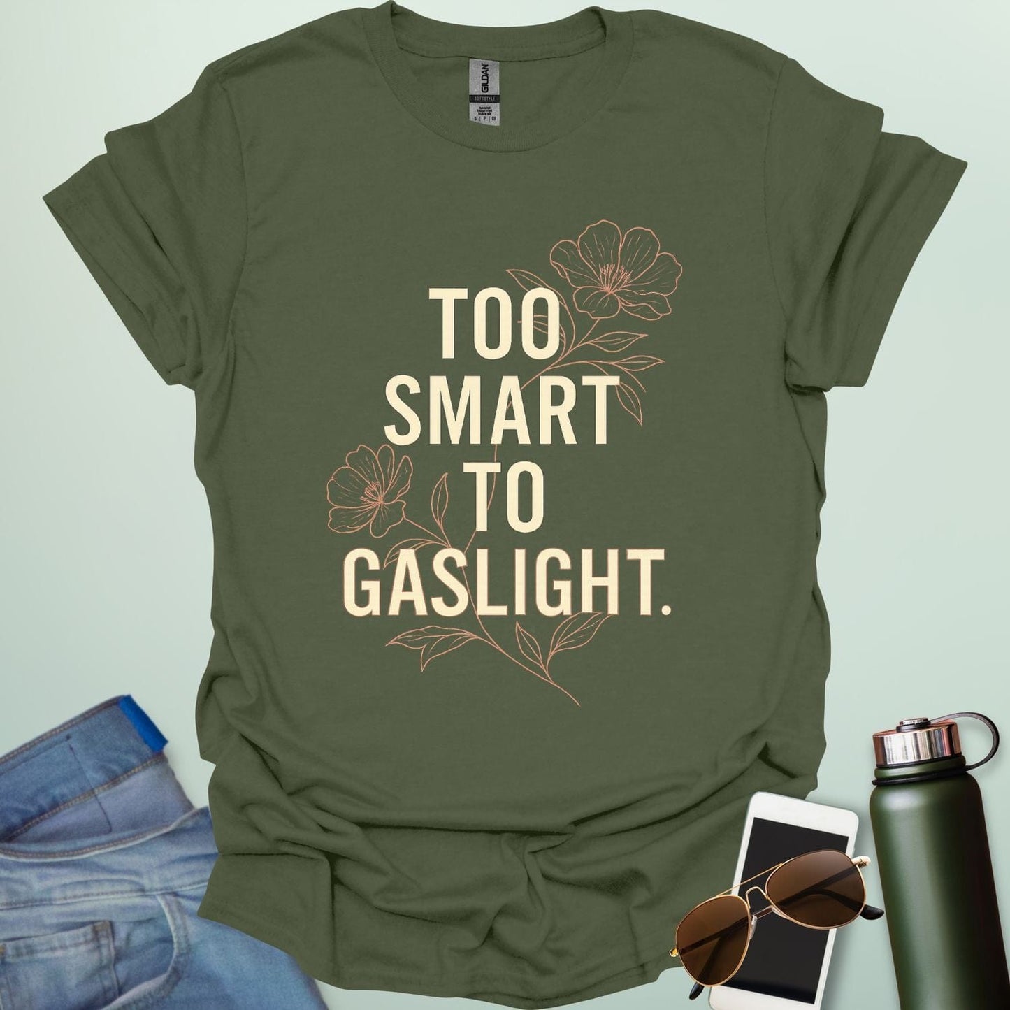 ‘Too Smart to Gaslight’ t-shirt with bold typography — statement tee for thinkers and mental health advocates.
