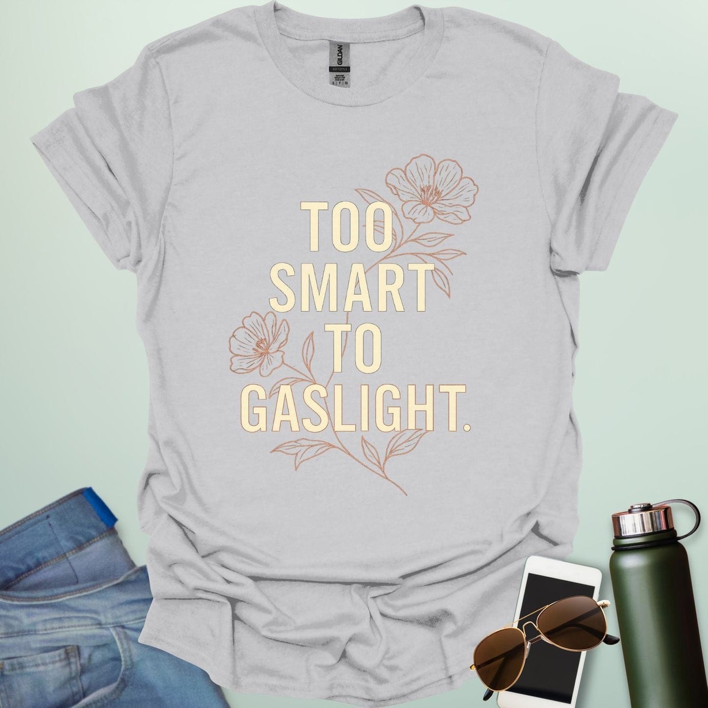 ‘Too Smart to Gaslight’ t-shirt with bold typography — statement tee for thinkers and mental health advocates.