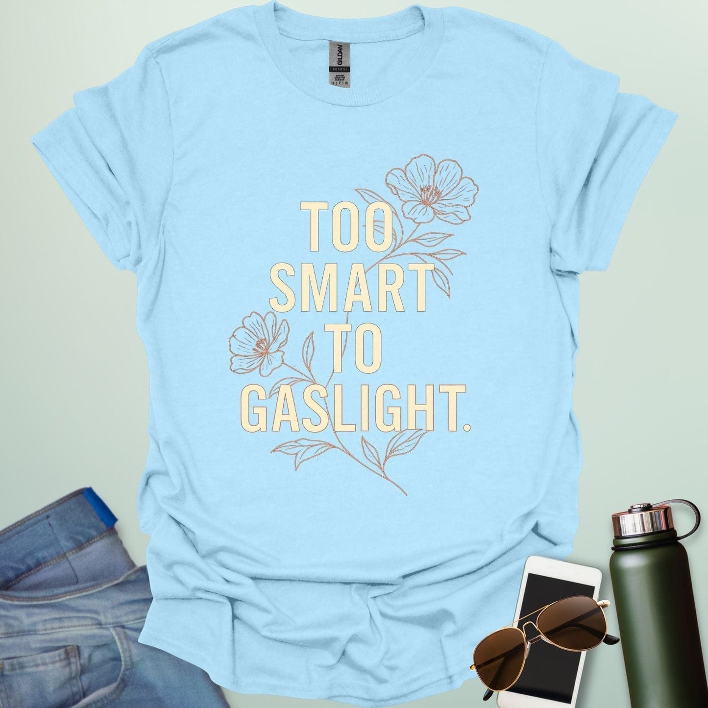 ‘Too Smart to Gaslight’ t-shirt with bold typography — statement tee for thinkers and mental health advocates.