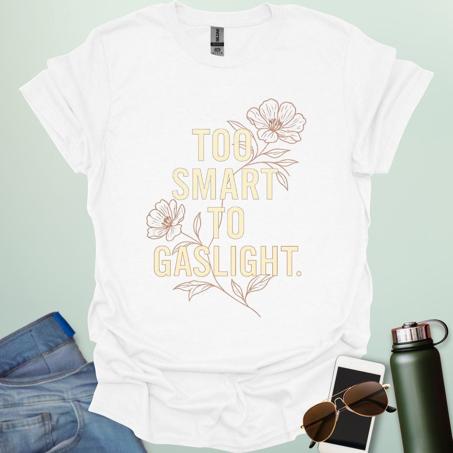 ‘Too Smart to Gaslight’ t-shirt with bold typography — statement tee for thinkers and mental health advocates.