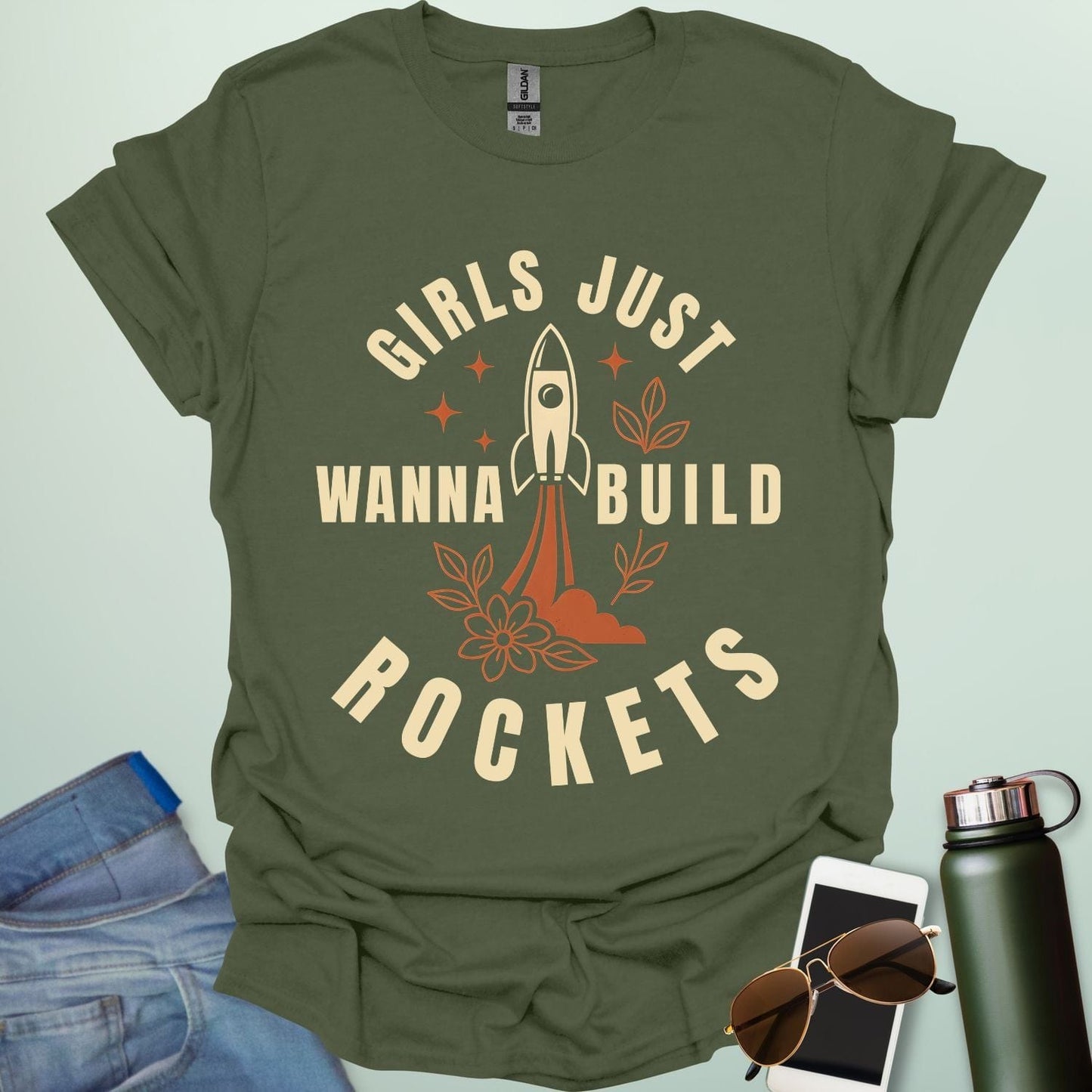 ‘Girls Just Wanna Build Rockets’ t-shirt with rocket illustration — STEM apparel for girls in engineering and space lovers.