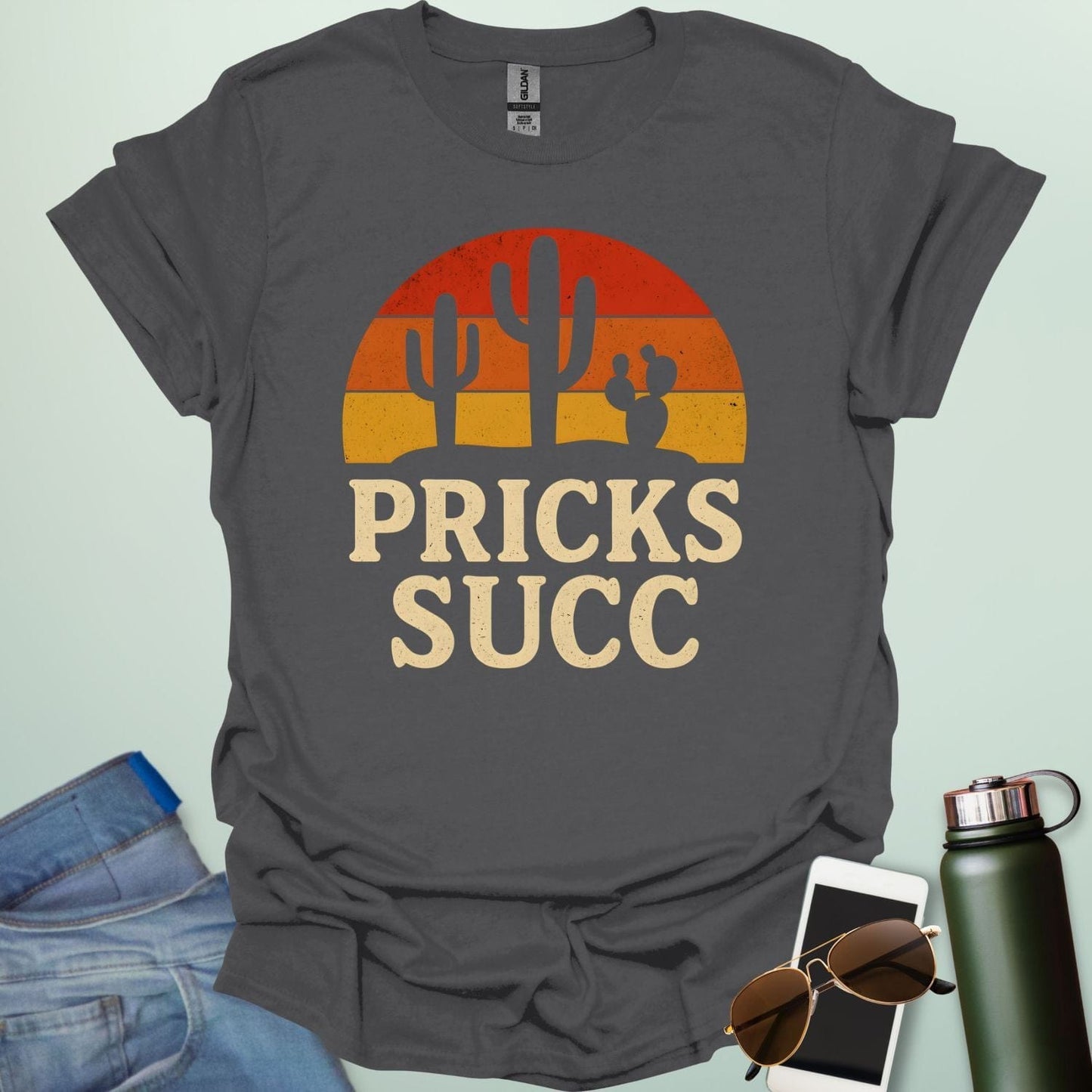 Cactus Pricks SUCC t-shirt design with bold text and succulent cactus graphic β a sarcastic botanical humor tee.