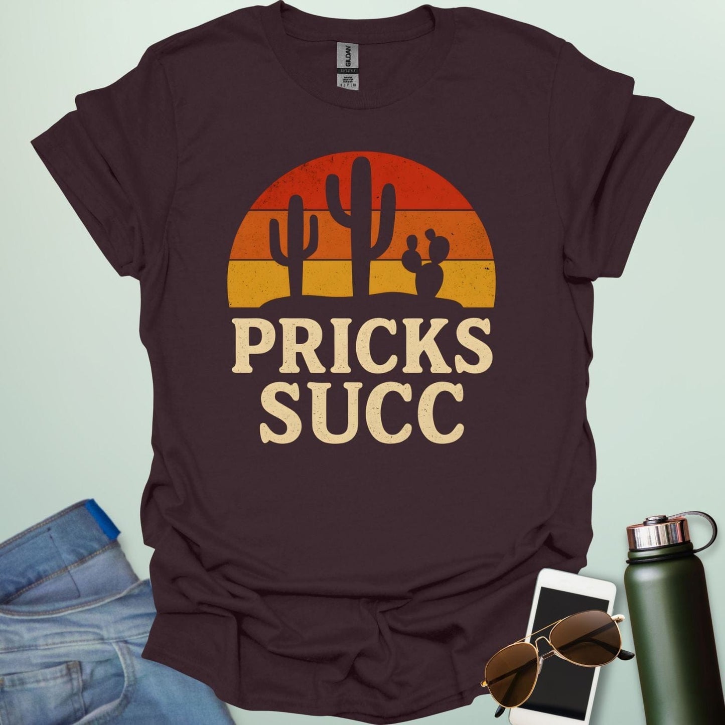 Cactus Pricks SUCC t-shirt design with bold text and succulent cactus graphic β a sarcastic botanical humor tee.