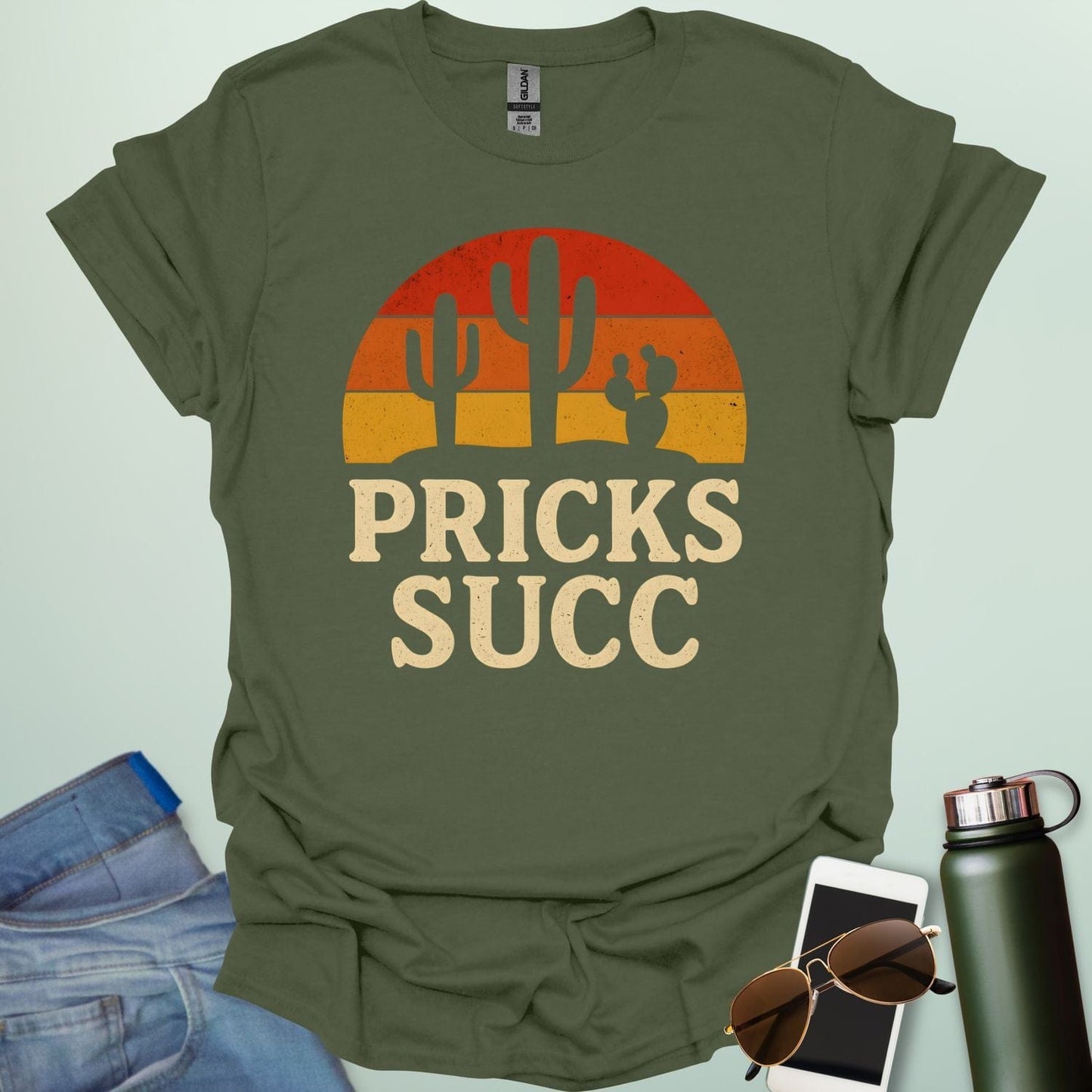 Cactus Pricks SUCC t-shirt design with bold text and succulent cactus graphic β a sarcastic botanical humor tee.