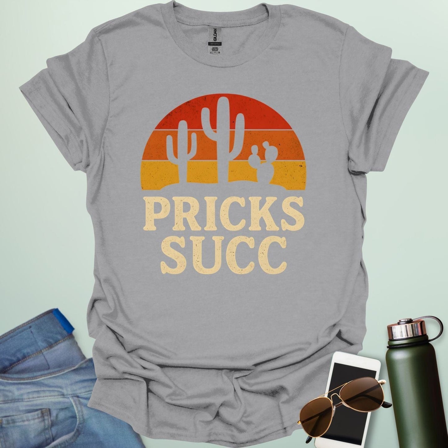 Cactus Pricks SUCC t-shirt design with bold text and succulent cactus graphic β a sarcastic botanical humor tee.