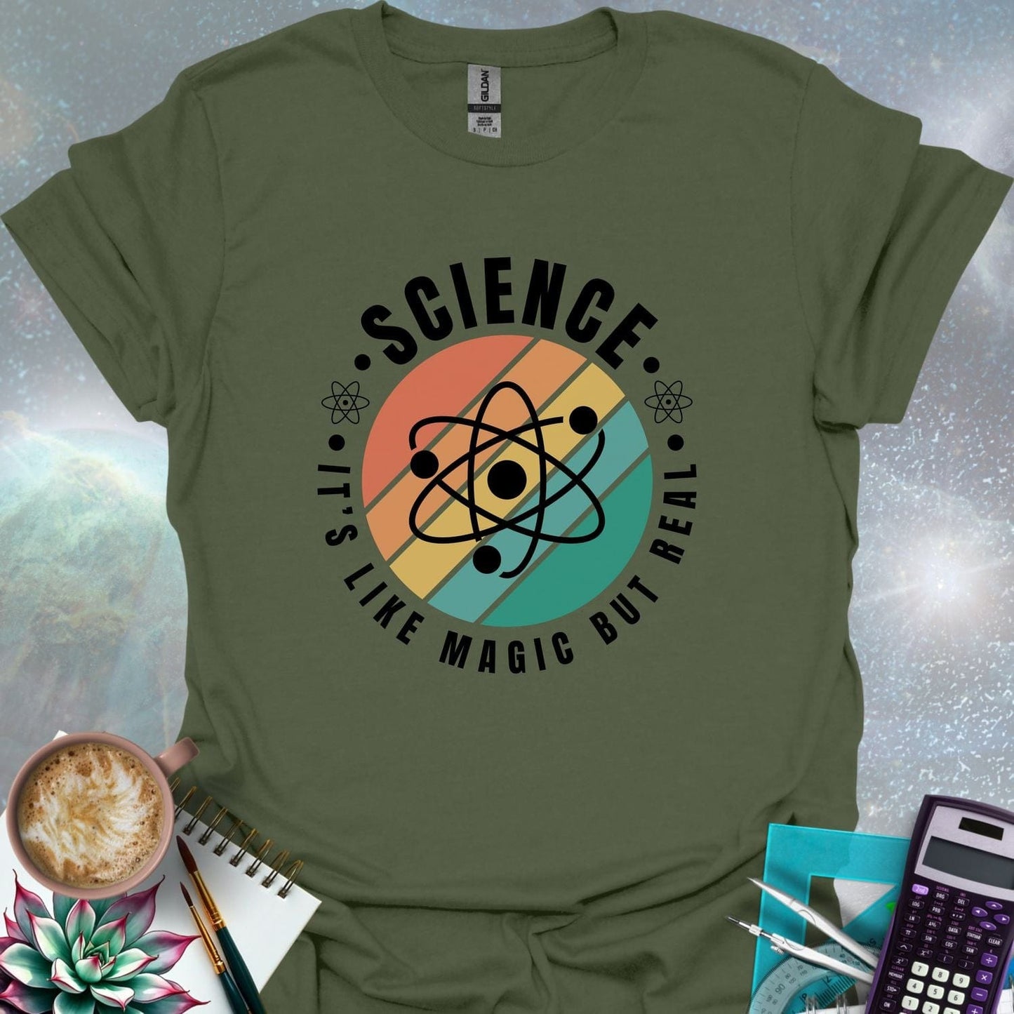 T-shirt with a clean design featuring an atom symbol and the quote 'Science - It's like magic but real'.