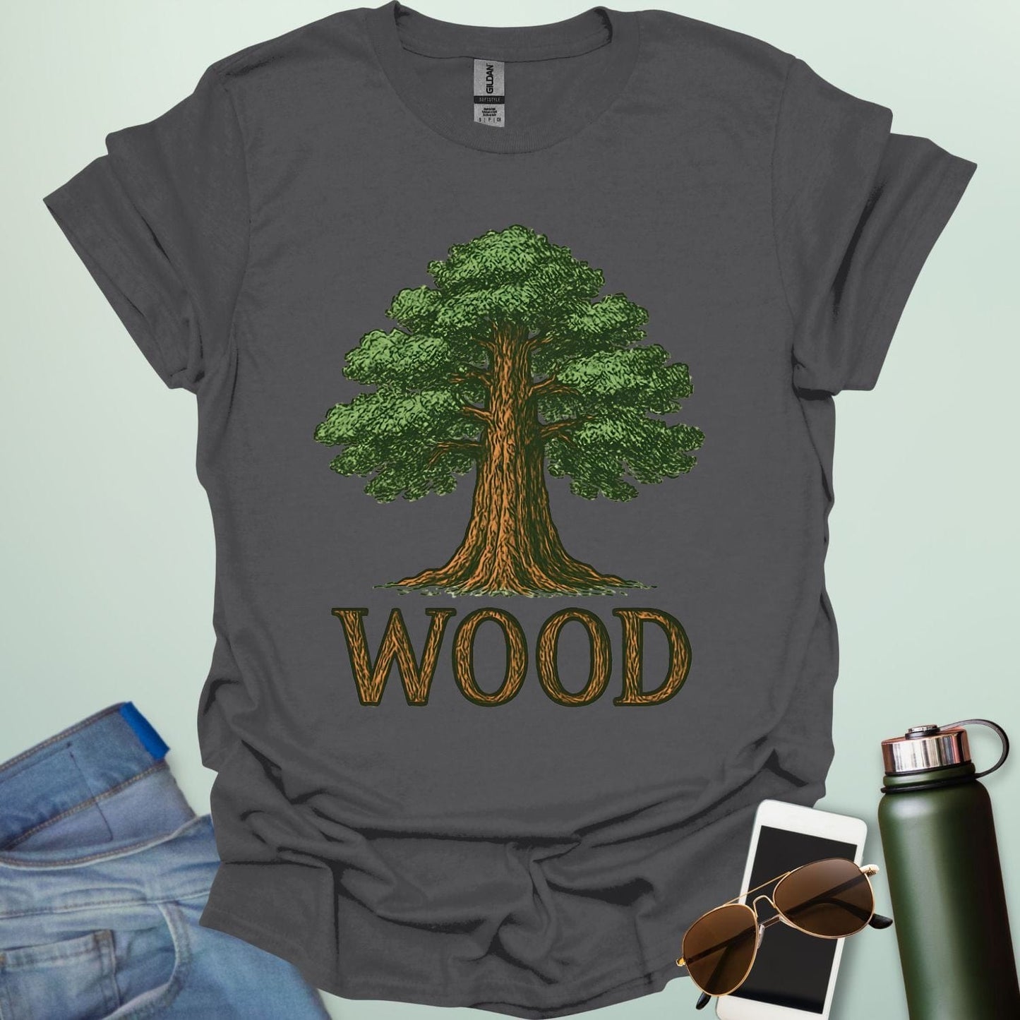 Wood tee with stylized tree / nature motif — perfect for fans of forests, national parks & Taylor Swift.