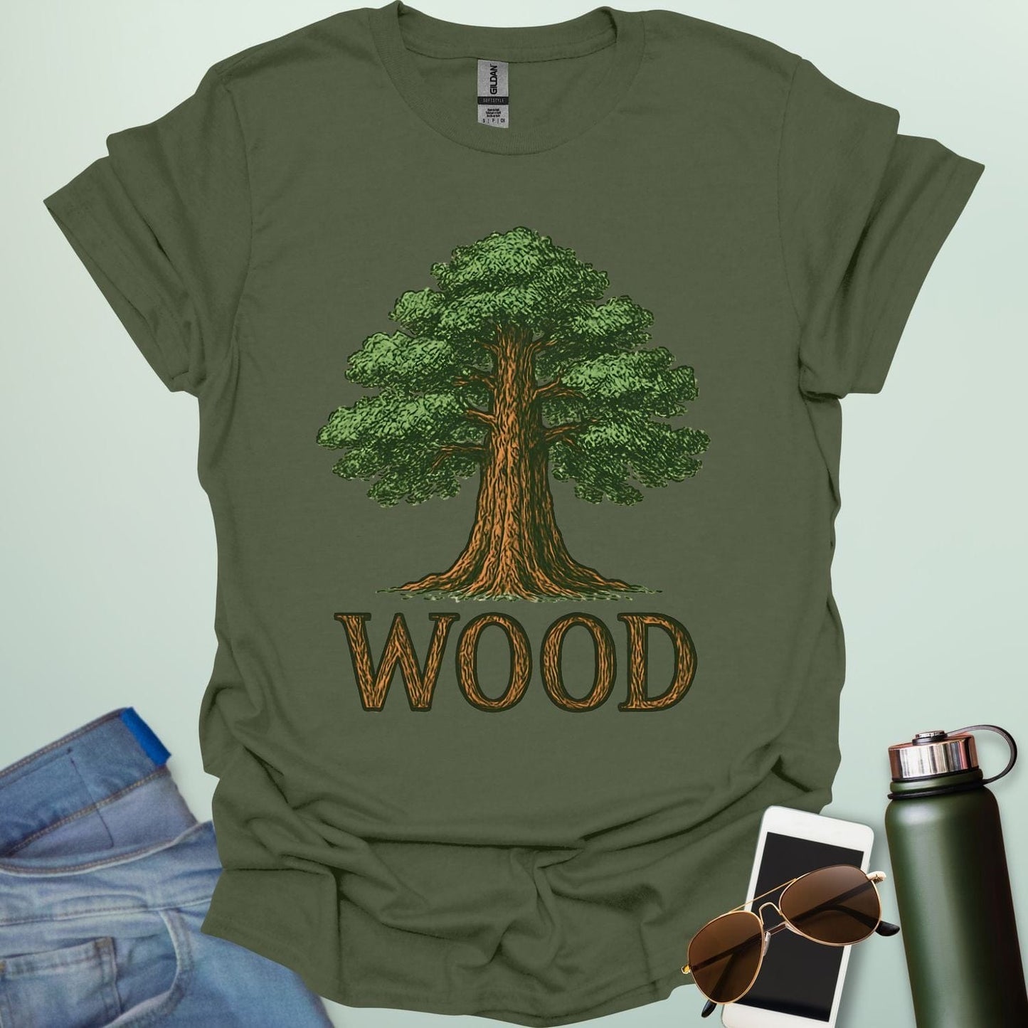 Wood tee with stylized tree / nature motif — perfect for fans of forests, national parks & Taylor Swift.