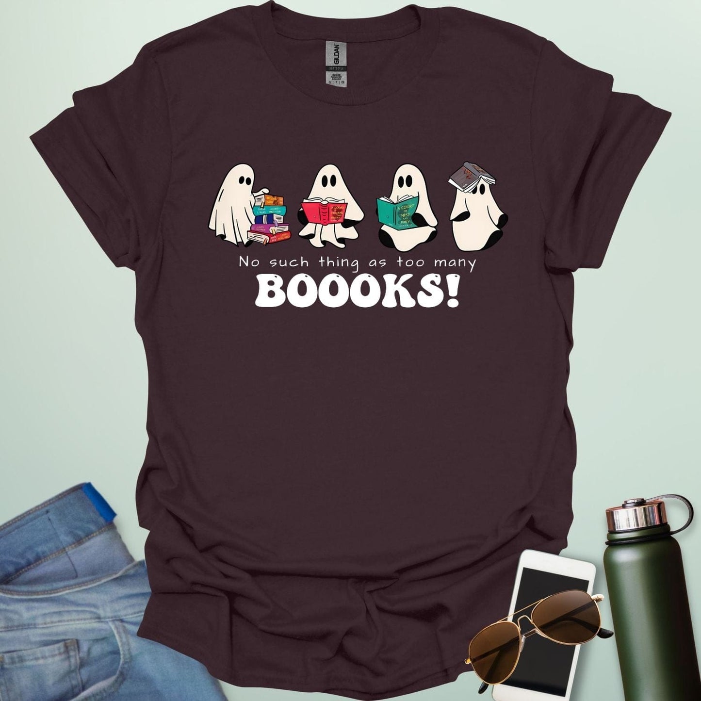 No Such Thing As Too Many Booooks t-shirt with ghostly lettering and book graphic β a spooky bookworm design for readers and teachers.