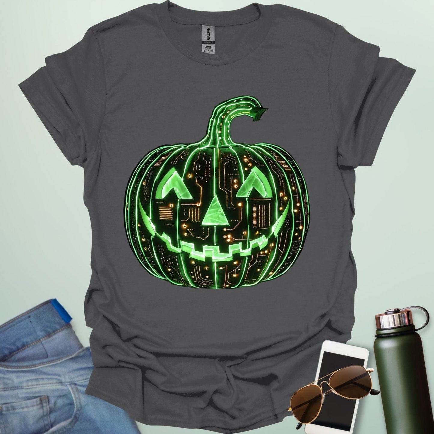 Pumpkin Tech t-shirt with glowing green jack-o-lantern circuit board design — Halloween STEM geek apparel.